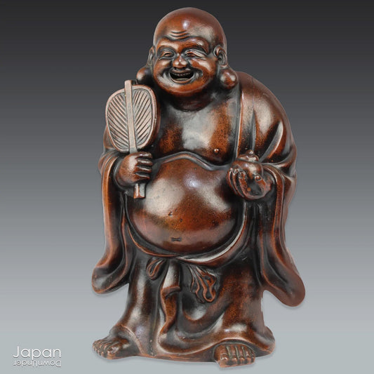 Step into the elegance of Japanese craftsmanship with this remarkable Meiji-era Bizen Hotei god sculpture. This rare treasure, with its understated yet powerful presence, invites the spirit of ancient Japanese artistry into your space. Whether you're an avid art collector, a lover of history, or simply someone who treasures the beauty of authentic craftsmanship, this piece offers a perfect blend of art, culture, and symbolism.