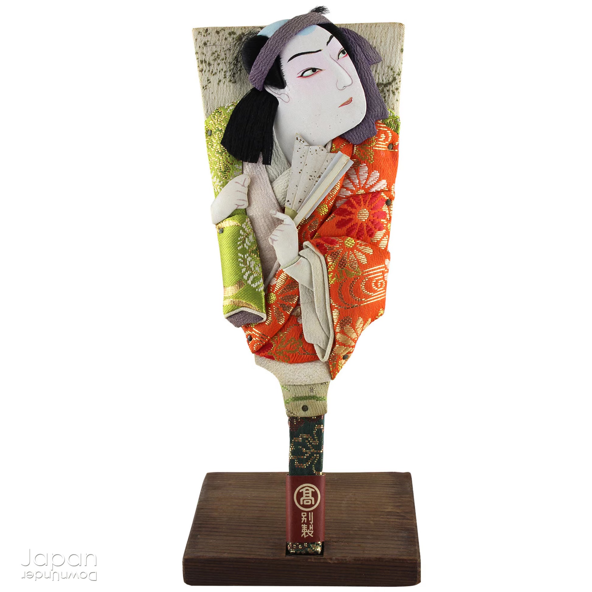 The hagoita has deep roots in Japanese New Year customs. Originally used in the game of hanetsuki - similar to badminton but played without a net - these paddles became symbolic protectors, their swift motion believed to dispel negative energy, much like the ceremonial gestures of a Shinto priest.