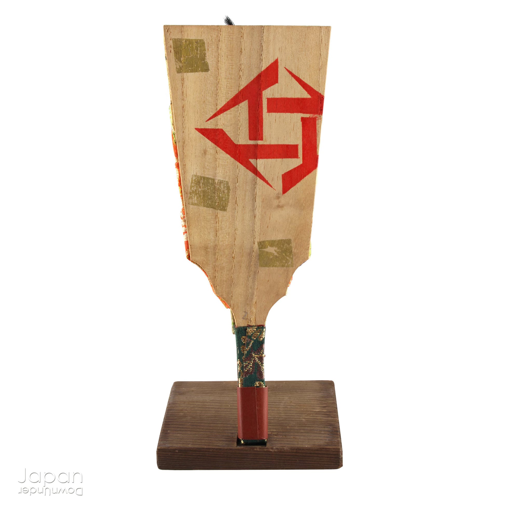 The hagoita has deep roots in Japanese New Year customs. Originally used in the game of hanetsuki - similar to badminton but played without a net - these paddles became symbolic protectors, their swift motion believed to dispel negative energy, much like the ceremonial gestures of a Shinto priest.