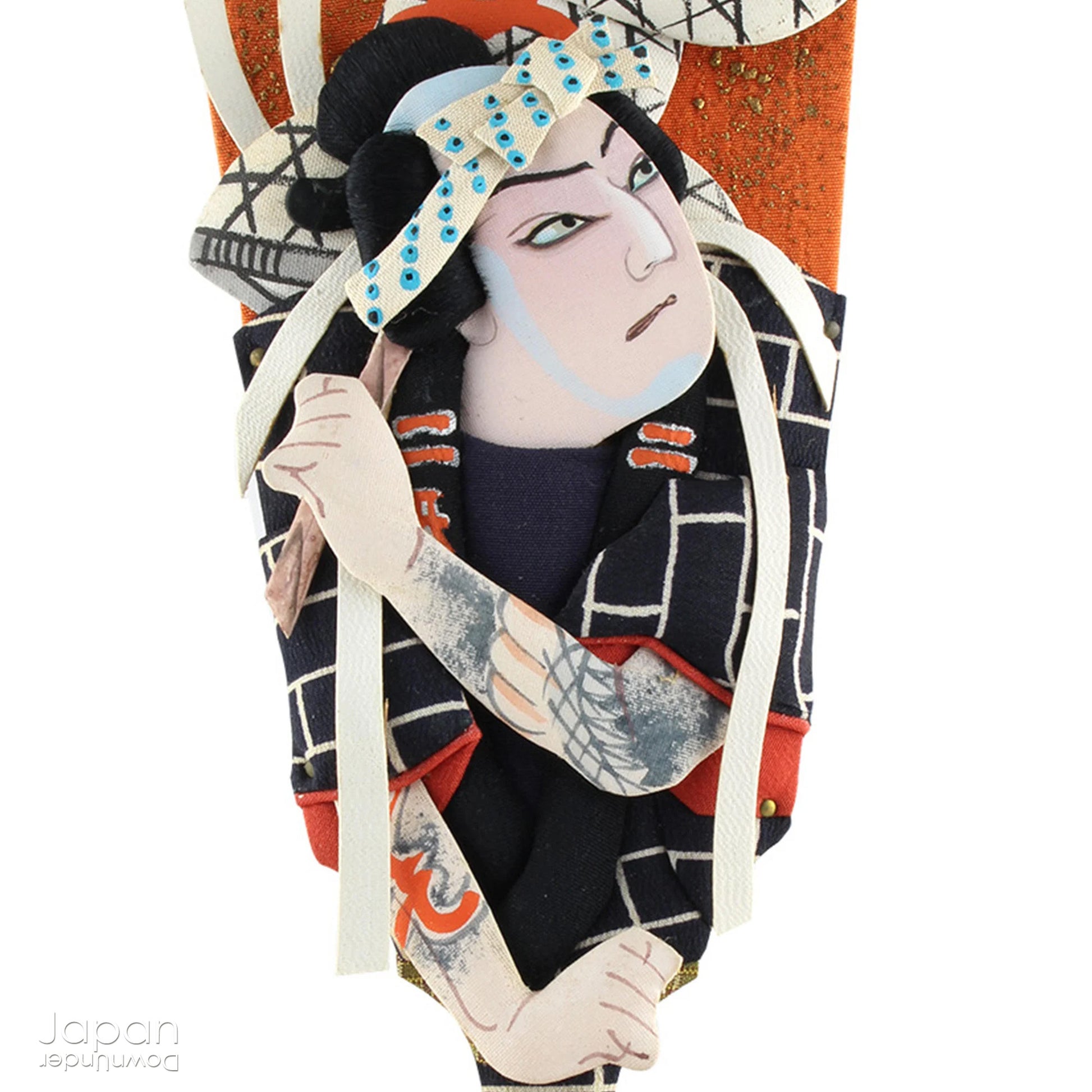 The hagoita has deep roots in Japanese New Year customs. Originally used in the game of hanetsuki - similar to badminton but played without a net - these paddles became symbolic protectors, their swift motion believed to dispel negative energy, much like the ceremonial gestures of a Shinto priest.