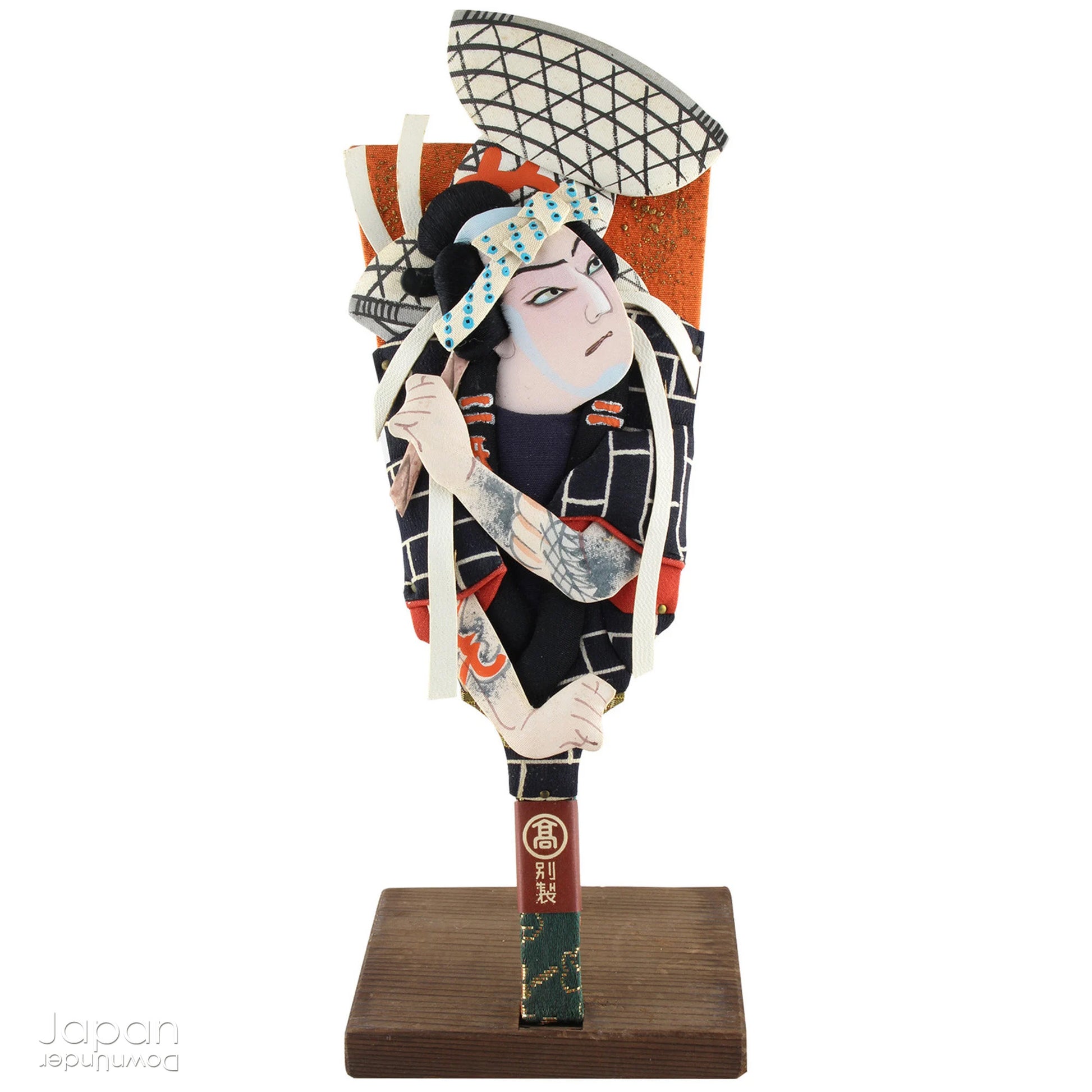 The hagoita has deep roots in Japanese New Year customs. Originally used in the game of hanetsuki - similar to badminton but played without a net - these paddles became symbolic protectors, their swift motion believed to dispel negative energy, much like the ceremonial gestures of a Shinto priest.