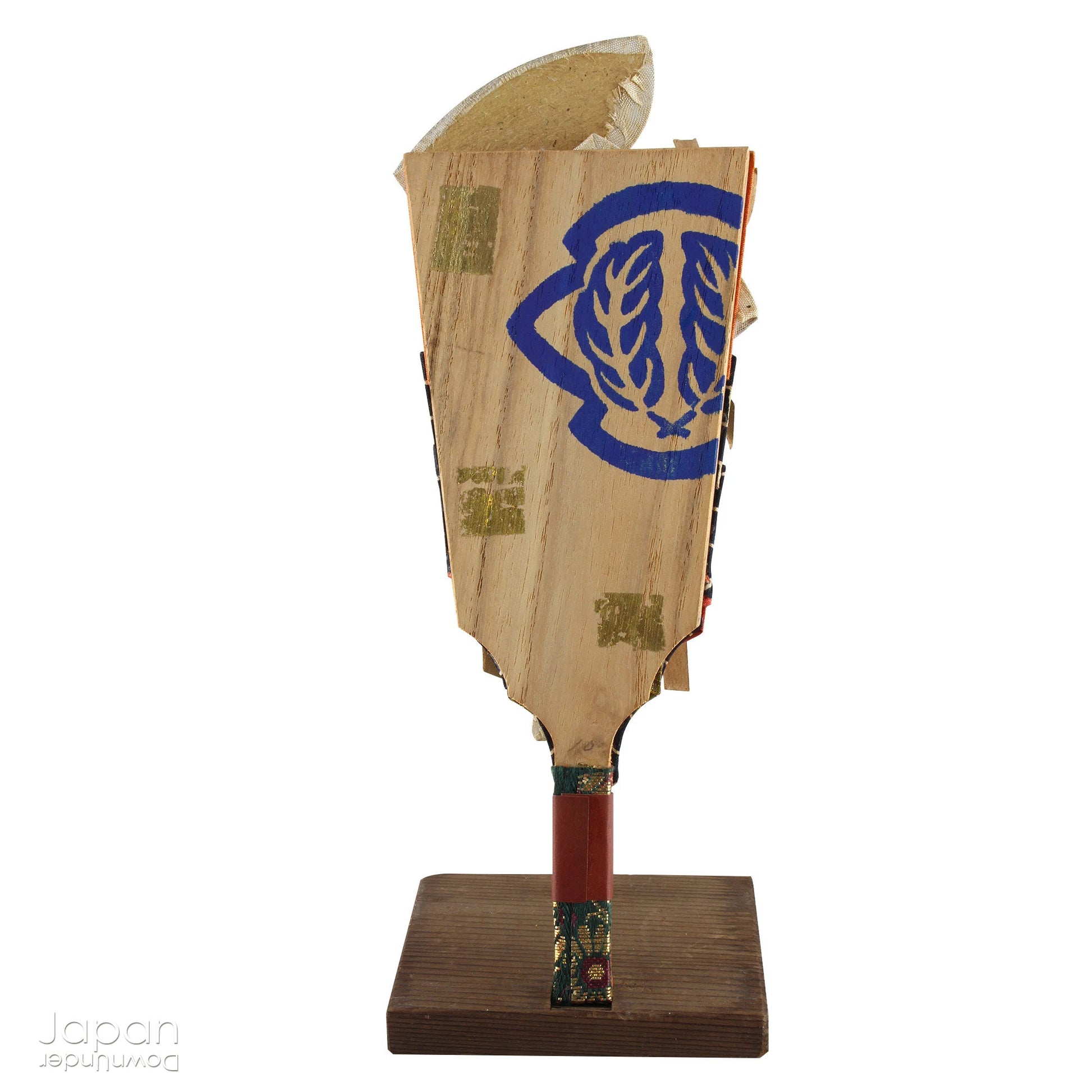 The hagoita has deep roots in Japanese New Year customs. Originally used in the game of hanetsuki - similar to badminton but played without a net - these paddles became symbolic protectors, their swift motion believed to dispel negative energy, much like the ceremonial gestures of a Shinto priest.