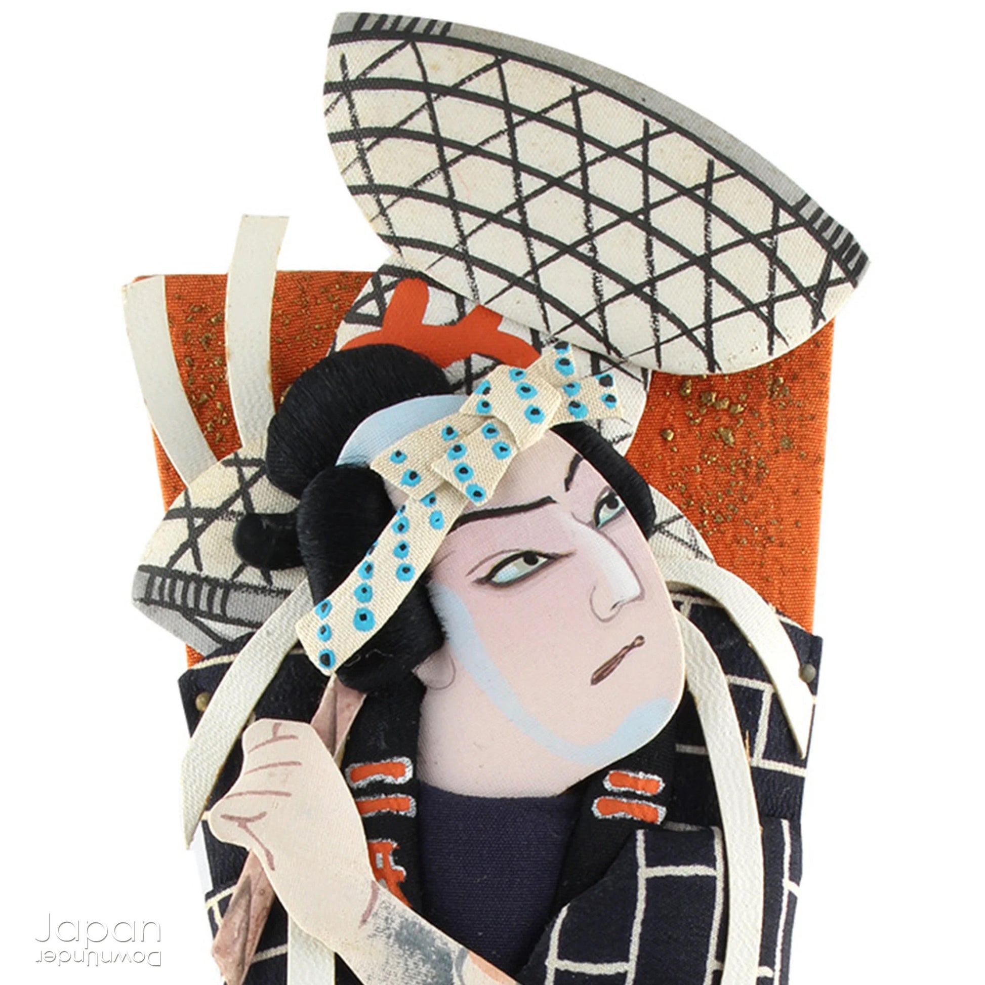 The hagoita has deep roots in Japanese New Year customs. Originally used in the game of hanetsuki - similar to badminton but played without a net - these paddles became symbolic protectors, their swift motion believed to dispel negative energy, much like the ceremonial gestures of a Shinto priest.