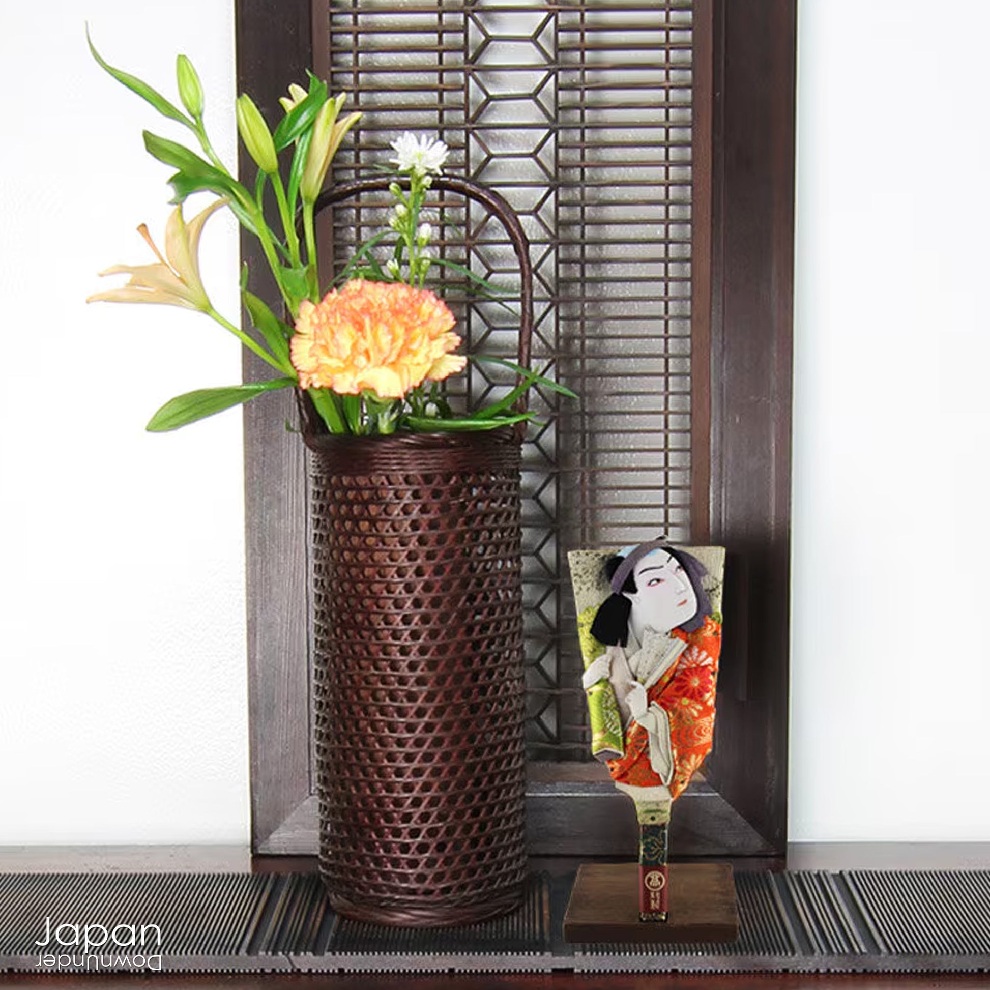 The hagoita has deep roots in Japanese New Year customs. Originally used in the game of hanetsuki - similar to badminton but played without a net - these paddles became symbolic protectors, their swift motion believed to dispel negative energy, much like the ceremonial gestures of a Shinto priest.