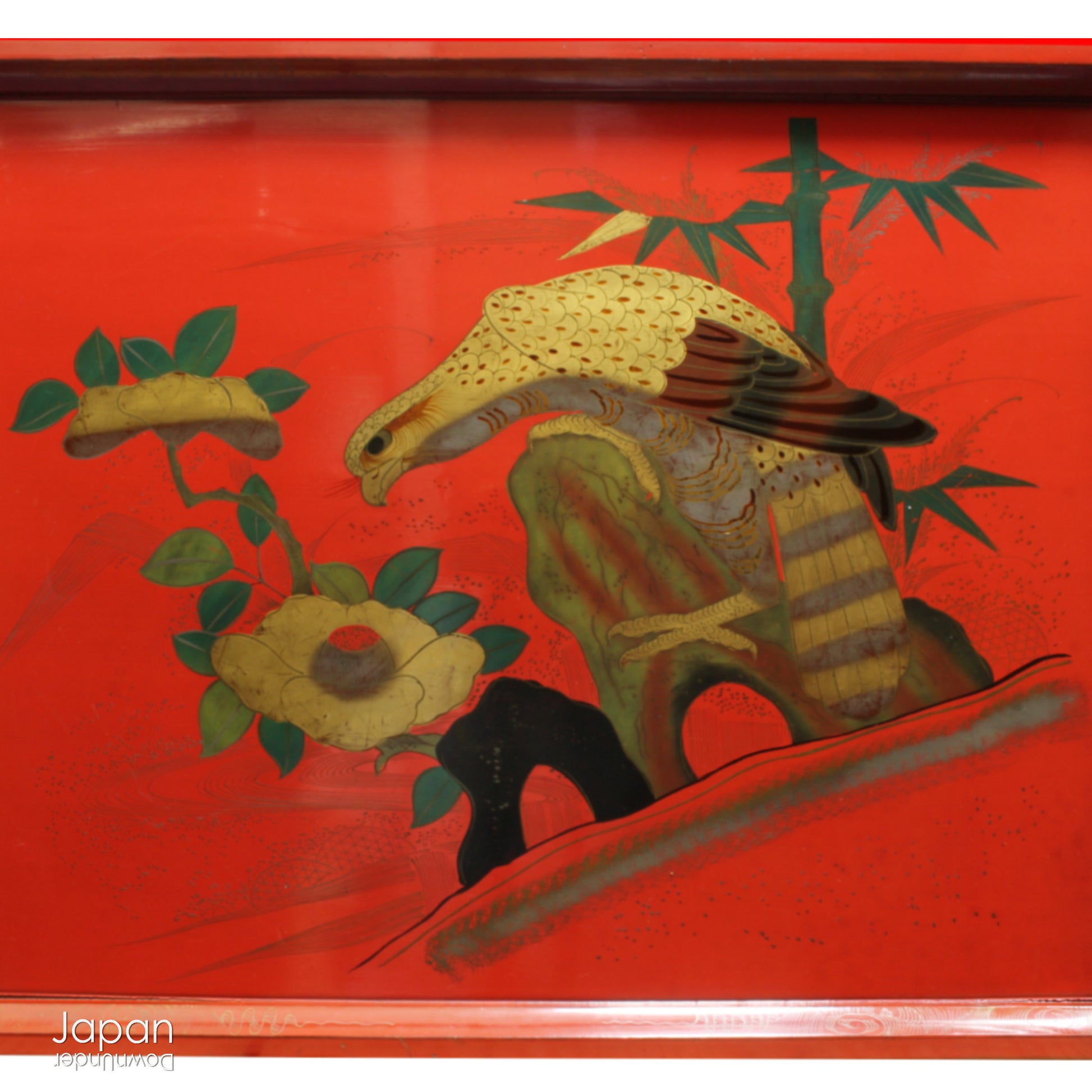This exquisite 1800s rare red lacquer tray is a captivating piece that transports you back in time. Featuring a majestic hawk surrounded by lush peonies and bamboo, it’s not just a tray - it's a stunning work of art that brings history, culture, and elegance into your space. A true treasure for collectors and those who appreciate antique beauty, this tray offers both charm and significance.