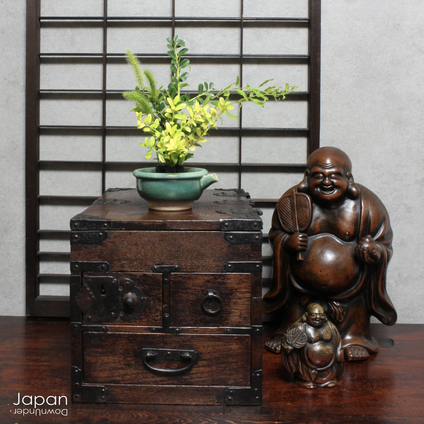 Step into the elegance of Japanese craftsmanship with this remarkable Meiji-era Bizen Hotei god sculpture. This rare treasure, with its understated yet powerful presence, invites the spirit of ancient Japanese artistry into your space. Whether you're an avid art collector, a lover of history, or simply someone who treasures the beauty of authentic craftsmanship, this piece offers a perfect blend of art, culture, and symbolism.