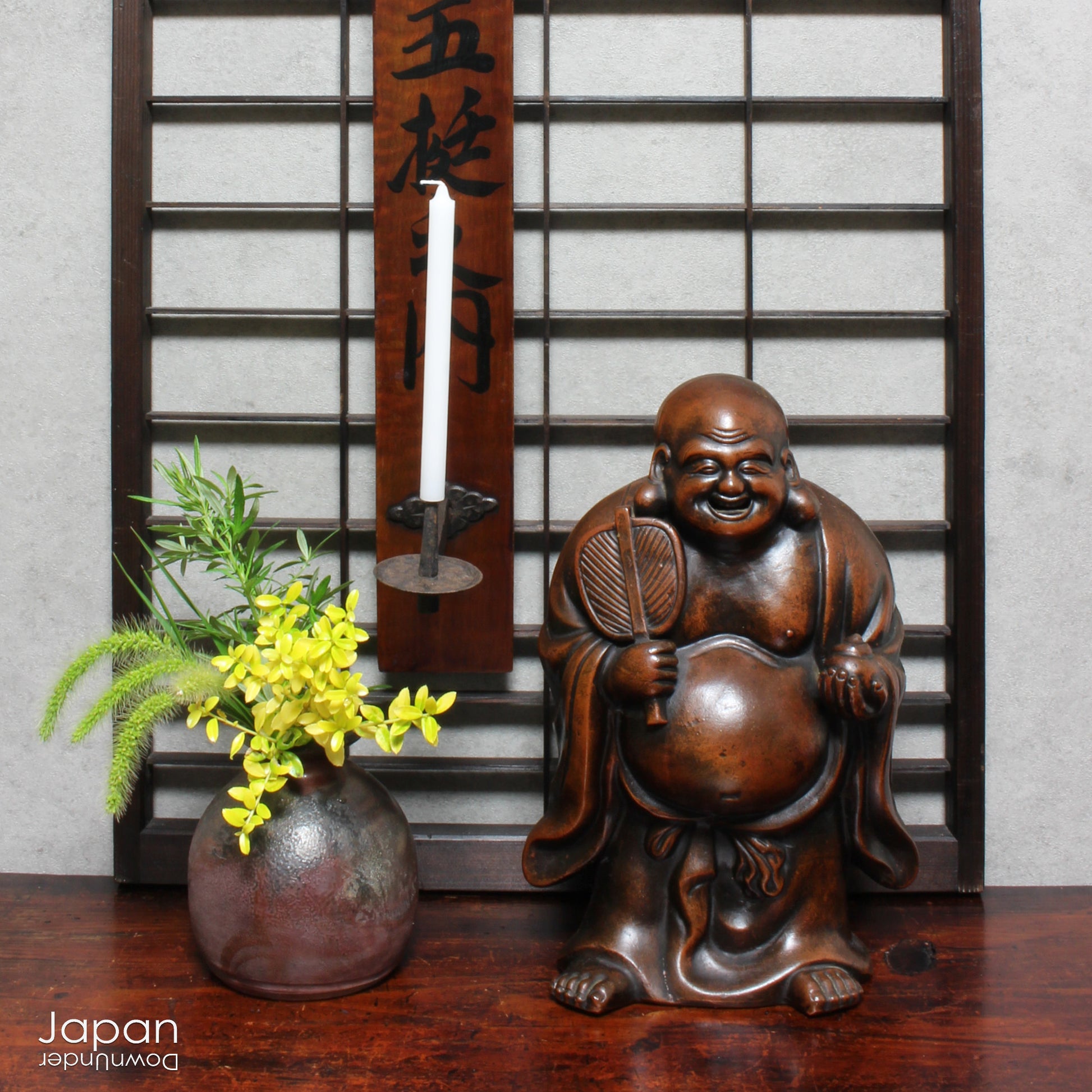 Step into the elegance of Japanese craftsmanship with this remarkable Meiji-era Bizen Hotei god sculpture. This rare treasure, with its understated yet powerful presence, invites the spirit of ancient Japanese artistry into your space. Whether you're an avid art collector, a lover of history, or simply someone who treasures the beauty of authentic craftsmanship, this piece offers a perfect blend of art, culture, and symbolism.
