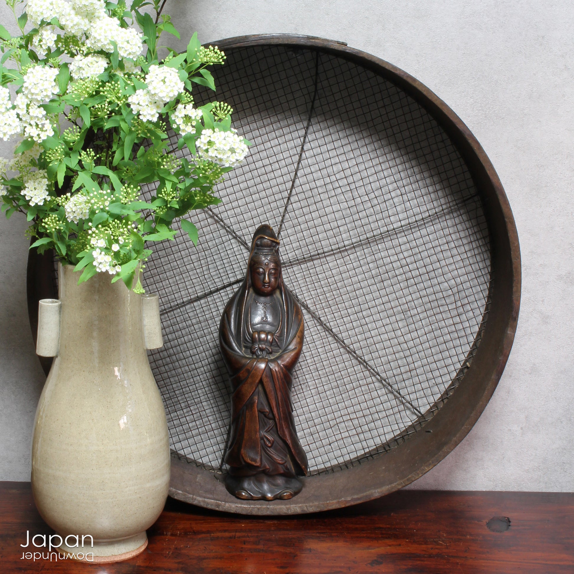 Elevate the ambiance of your home or office with this stunning antique Bizen statue of Kannon, the revered Goddess of Mercy. Masterfully crafted with intricate detail, this statue exudes a timeless sense of serenity and grace, perfect for creating a peaceful atmosphere in any setting.