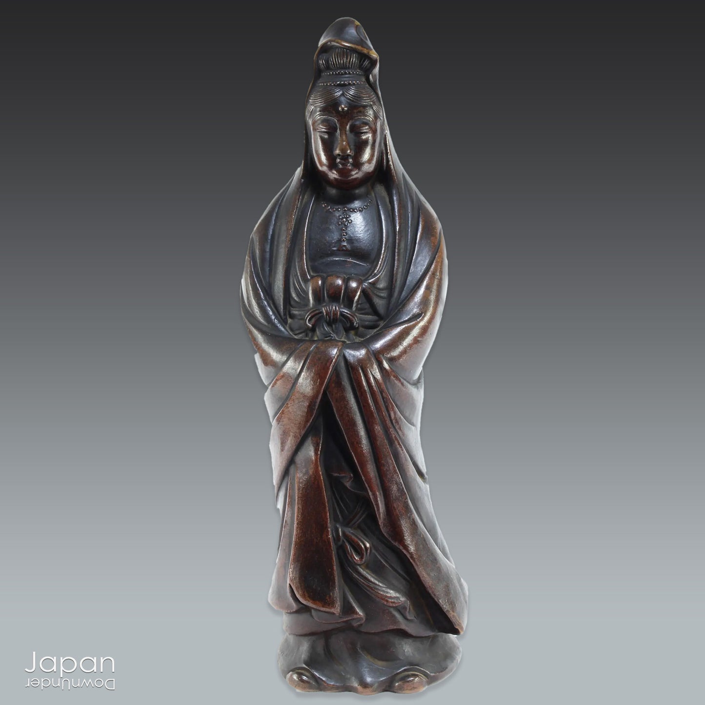 Elevate the ambiance of your home or office with this stunning antique Bizen statue of Kannon, the revered Goddess of Mercy. Masterfully crafted with intricate detail, this statue exudes a timeless sense of serenity and grace, perfect for creating a peaceful atmosphere in any setting.