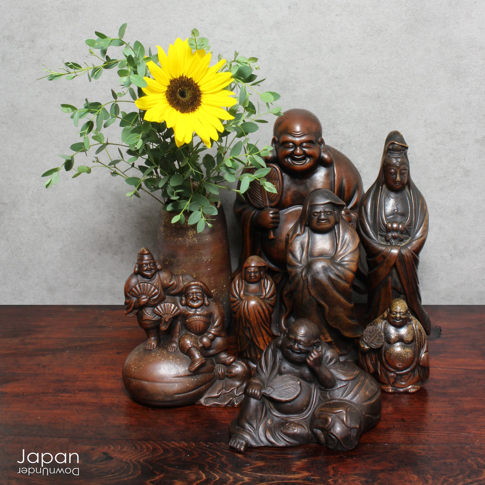 Step into the elegance of Japanese craftsmanship with this remarkable Meiji-era Bizen Hotei god sculpture. This rare treasure, with its understated yet powerful presence, invites the spirit of ancient Japanese artistry into your space. Whether you're an avid art collector, a lover of history, or simply someone who treasures the beauty of authentic craftsmanship, this piece offers a perfect blend of art, culture, and symbolism.