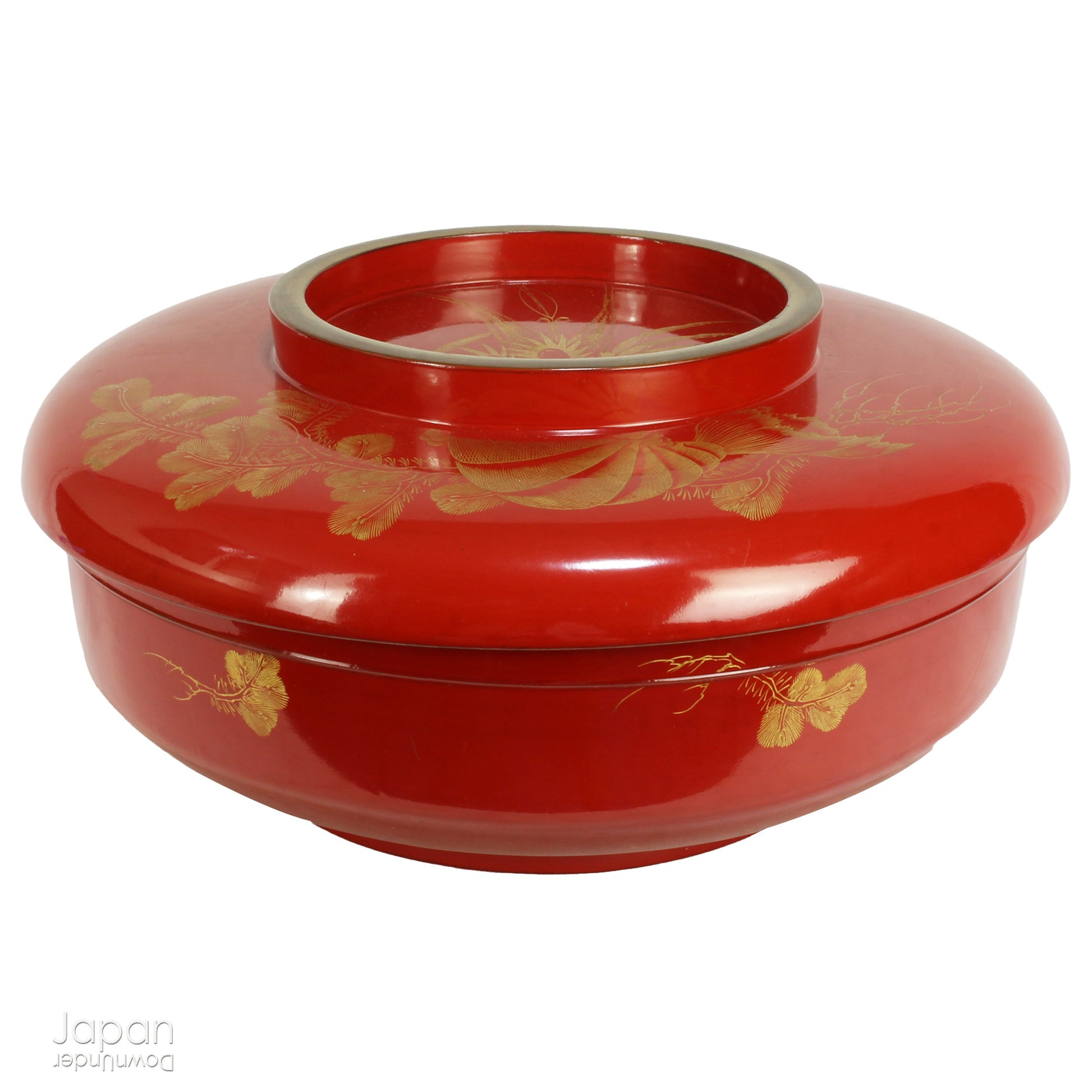 Red decorative box with gold floral patterns.