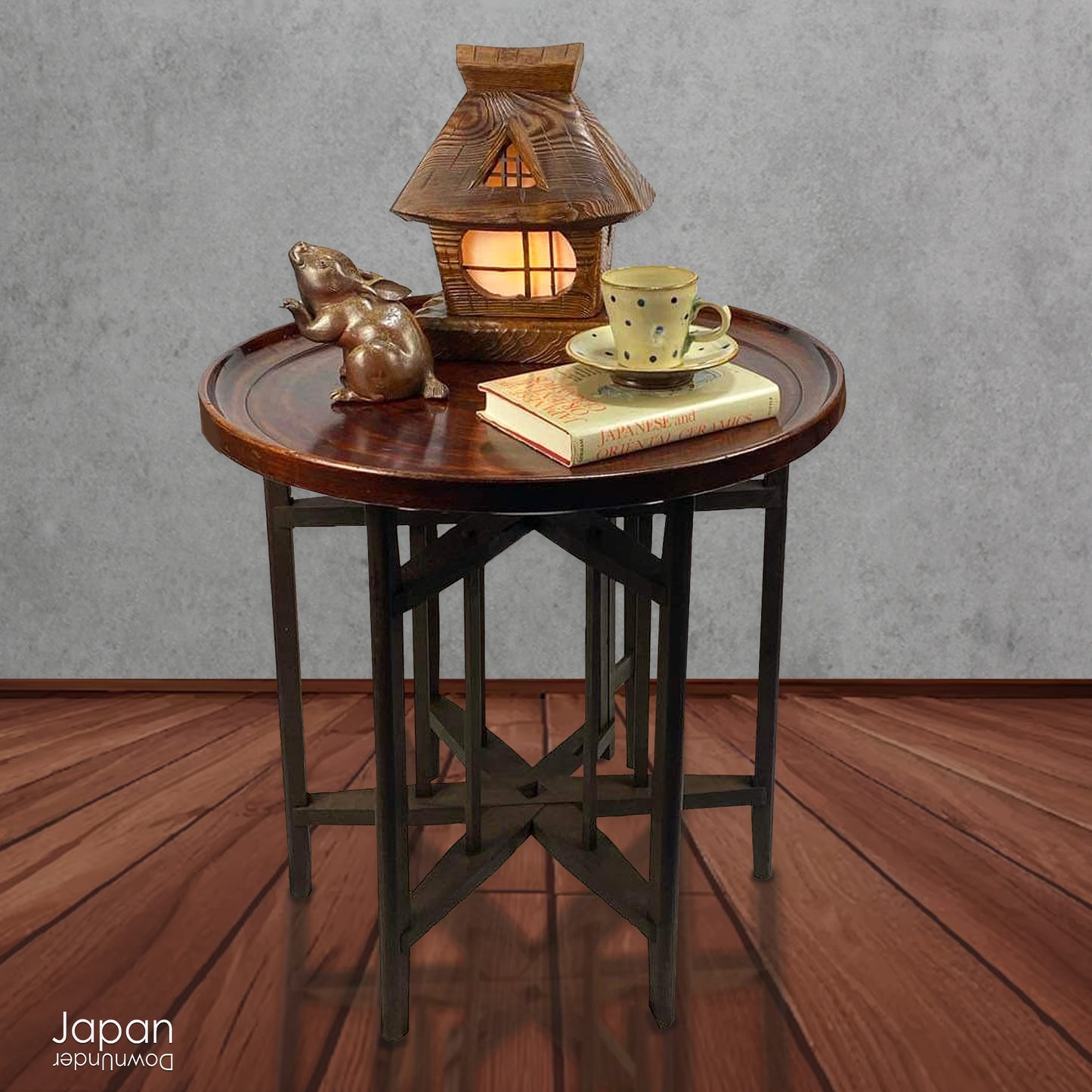 Add timeless charm and rustic elegance to your home with this exceptionally large antique round tea tray, hand-carved from a single cross-section of zelkova (keyaki) wood. A beautiful marriage of form and function, this piece serves equally well as a statement display stand, a unique tabletop, or a traditional tea-serving tray.