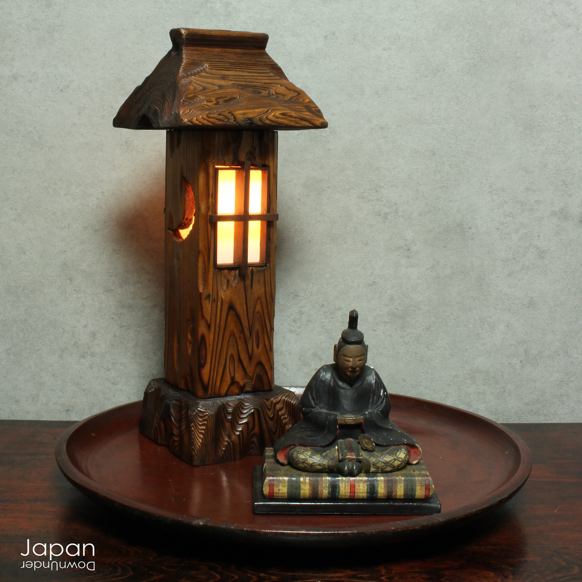 Bring warmth and tranquility to your home with this stunning vintage Japanese table lamp, crafted from Akita cedar wood. Inspired by the serene beauty of traditional Japanese garden lanterns, this unique piece casts a soft, ambient glow, perfect for creating a peaceful atmosphere in any room and adding a touch of Zen to your home.