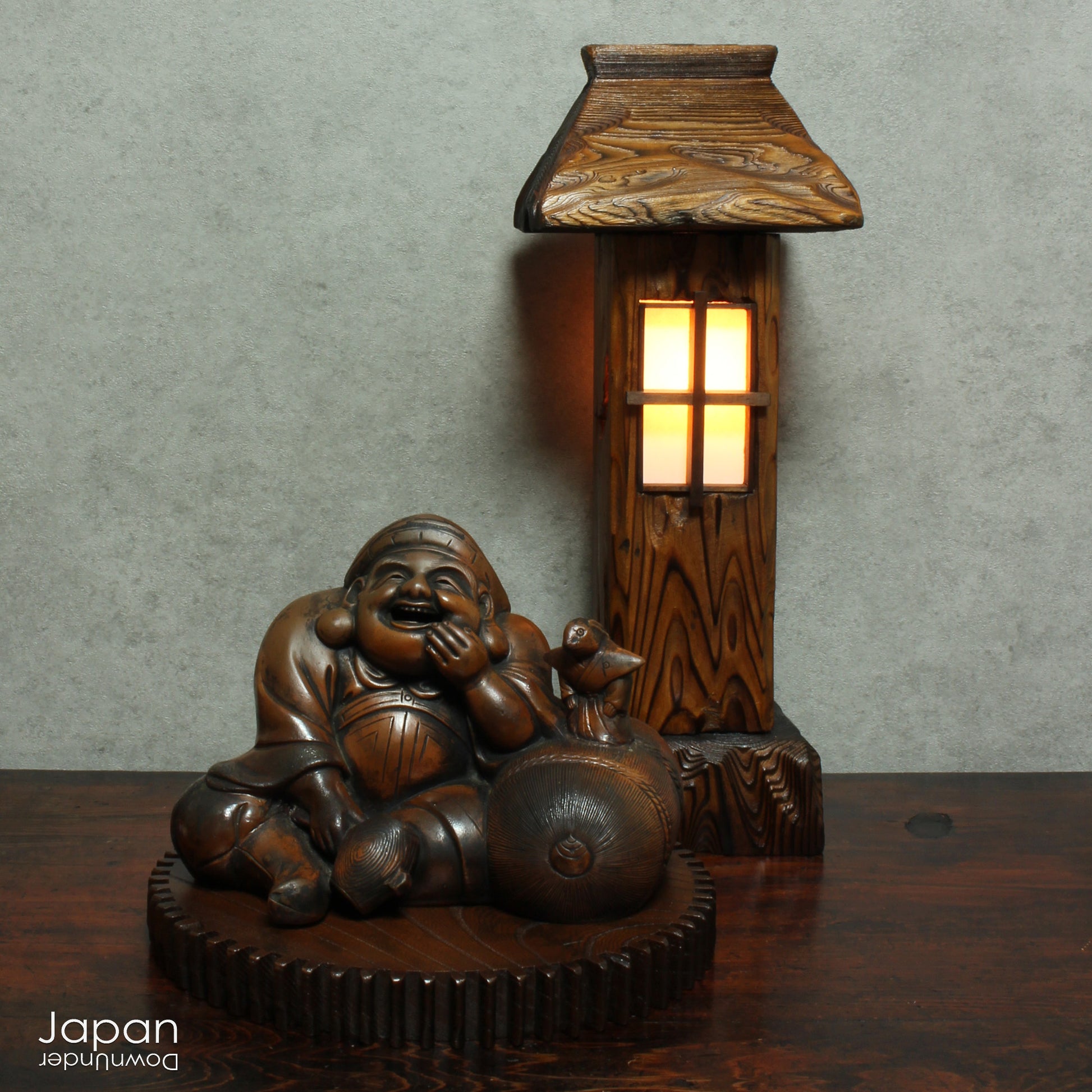 Bring warmth and tranquility to your home with this stunning vintage Japanese table lamp, crafted from Akita cedar wood. Inspired by the serene beauty of traditional Japanese garden lanterns, this unique piece casts a soft, ambient glow, perfect for creating a peaceful atmosphere in any room and adding a touch of Zen to your home.