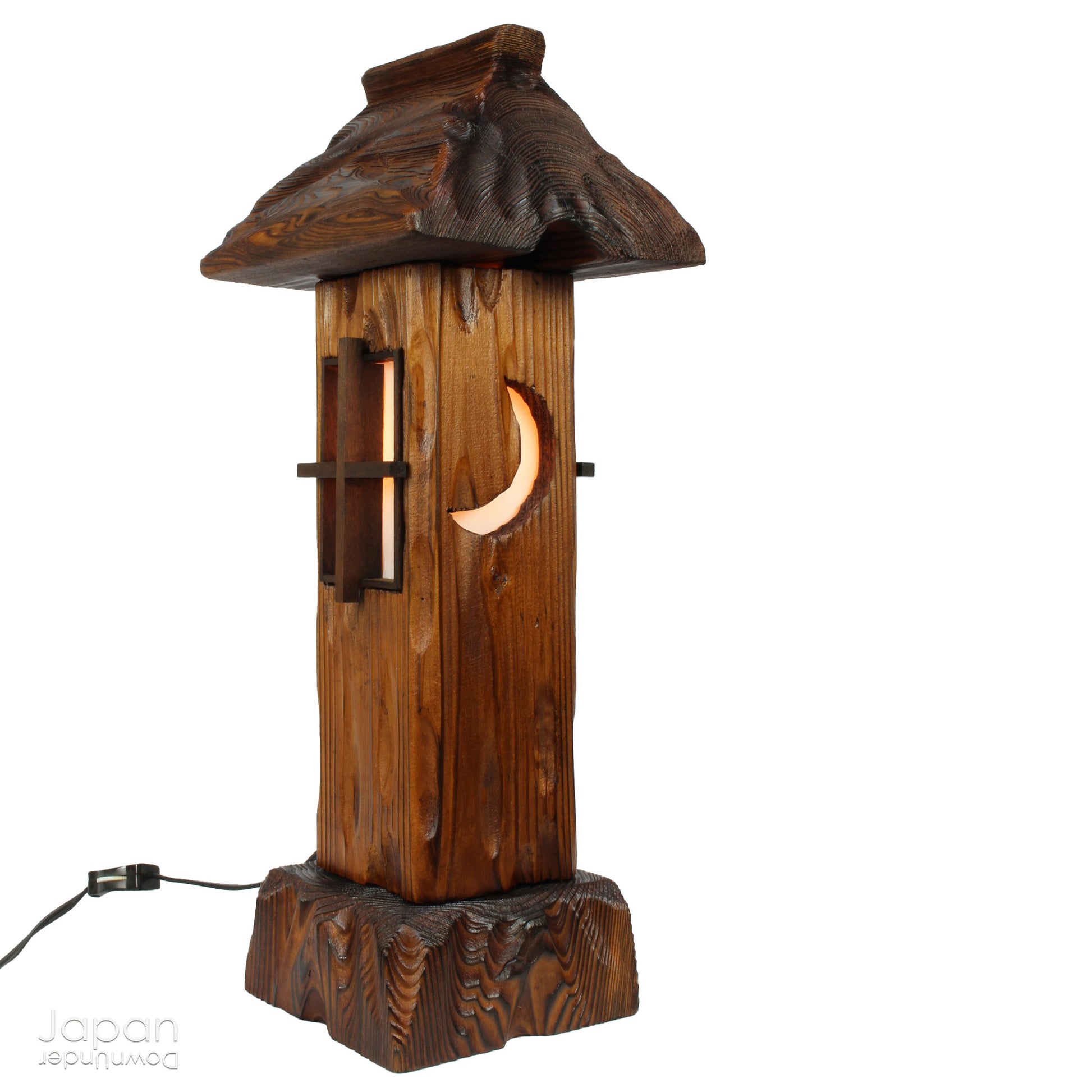 Bring warmth and tranquility to your home with this stunning vintage Japanese table lamp, crafted from Akita cedar wood. Inspired by the serene beauty of traditional Japanese garden lanterns, this unique piece casts a soft, ambient glow, perfect for creating a peaceful atmosphere in any room and adding a touch of Zen to your home.