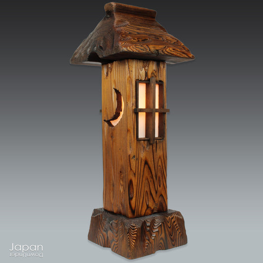 Bring warmth and tranquility to your home with this stunning vintage Japanese table lamp, crafted from Akita cedar wood. Inspired by the serene beauty of traditional Japanese garden lanterns, this unique piece casts a soft, ambient glow, perfect for creating a peaceful atmosphere in any room and adding a touch of Zen to your home.