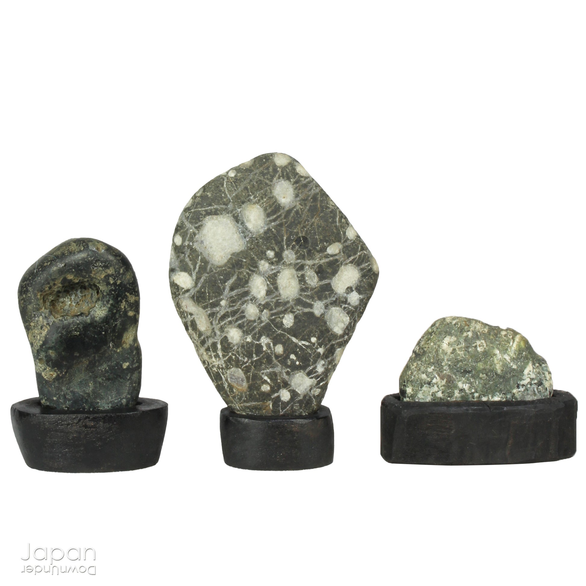 Elevate your home decor with this striking, modern collection of vintage Japanese miniature suiseki stones, beautifully arranged on a handcrafted, vase-shaped segmented shelf. These naturally sculpted stones evoke the essence of serene landscapes and bring a sense of harmony, sophistication, and contemplative stillness to any space.