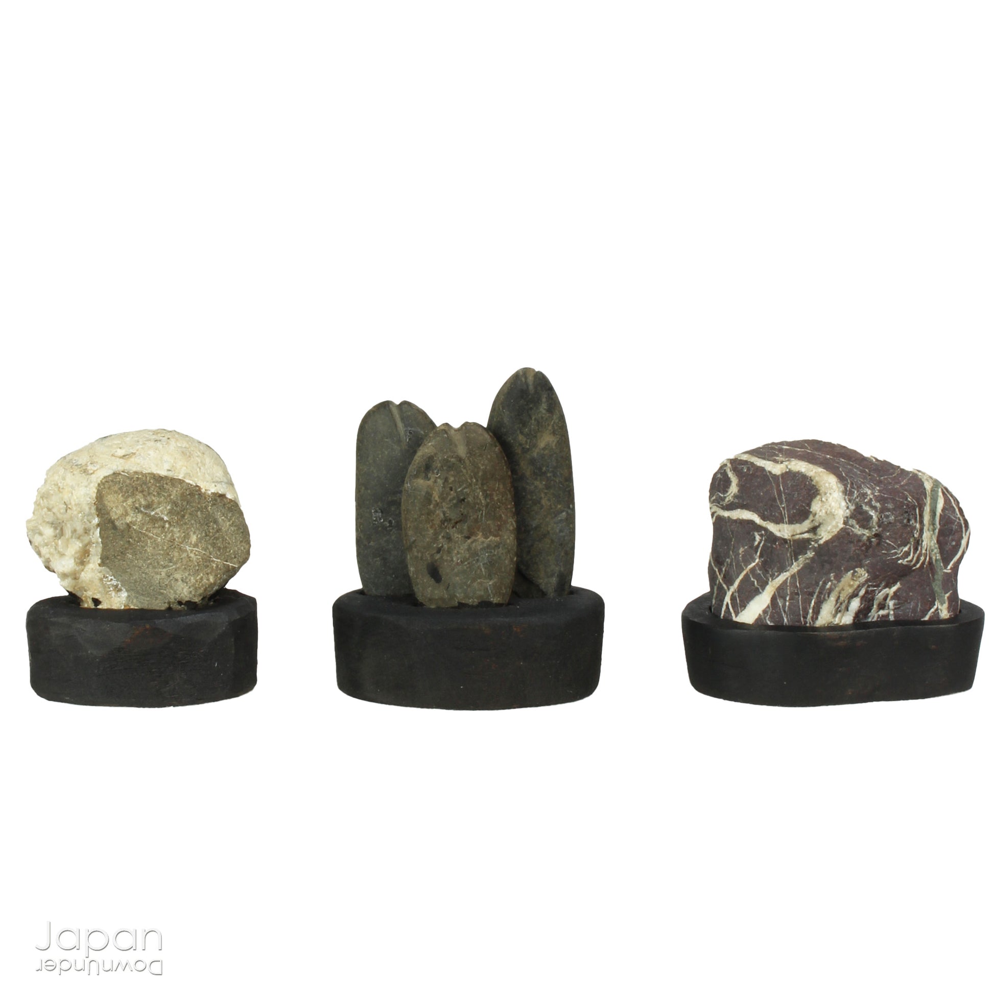 Elevate your home decor with this striking, modern collection of vintage Japanese miniature suiseki stones, beautifully arranged on a handcrafted, vase-shaped segmented shelf. These naturally sculpted stones evoke the essence of serene landscapes and bring a sense of harmony, sophistication, and contemplative stillness to any space.