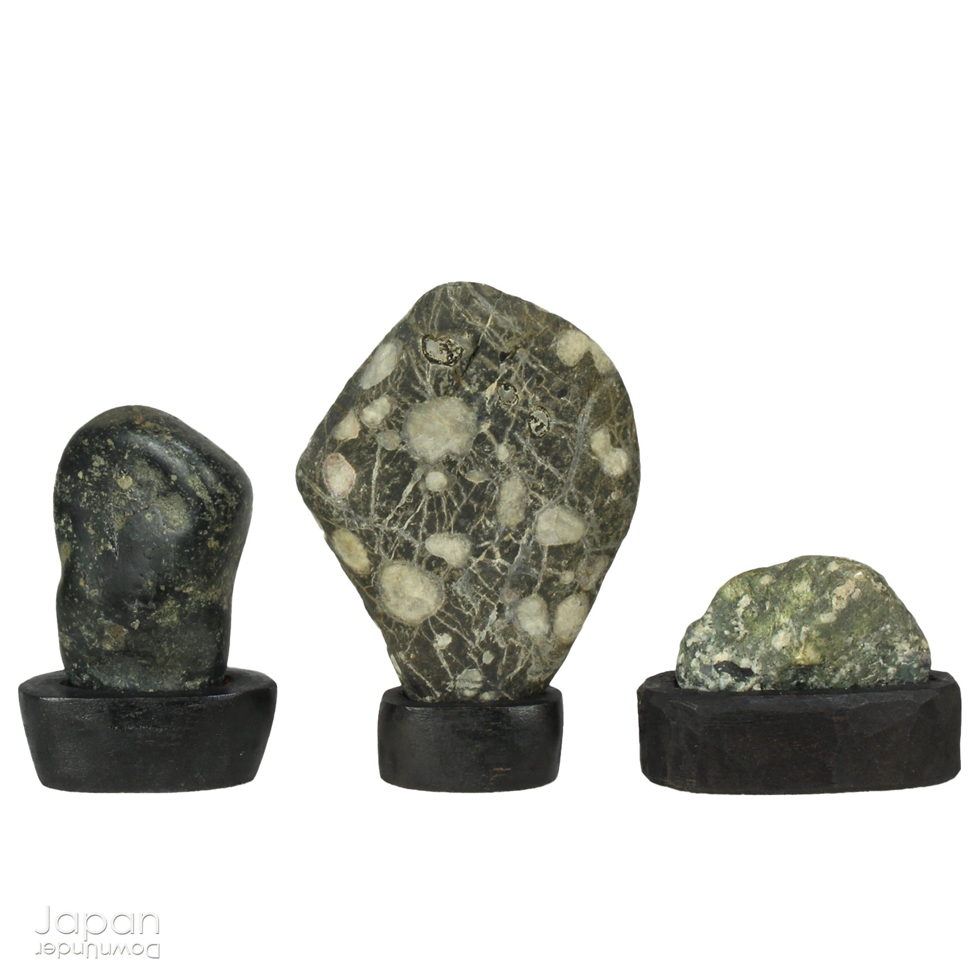Elevate your home decor with this striking, modern collection of vintage Japanese miniature suiseki stones, beautifully arranged on a handcrafted, vase-shaped segmented shelf. These naturally sculpted stones evoke the essence of serene landscapes and bring a sense of harmony, sophistication, and contemplative stillness to any space.