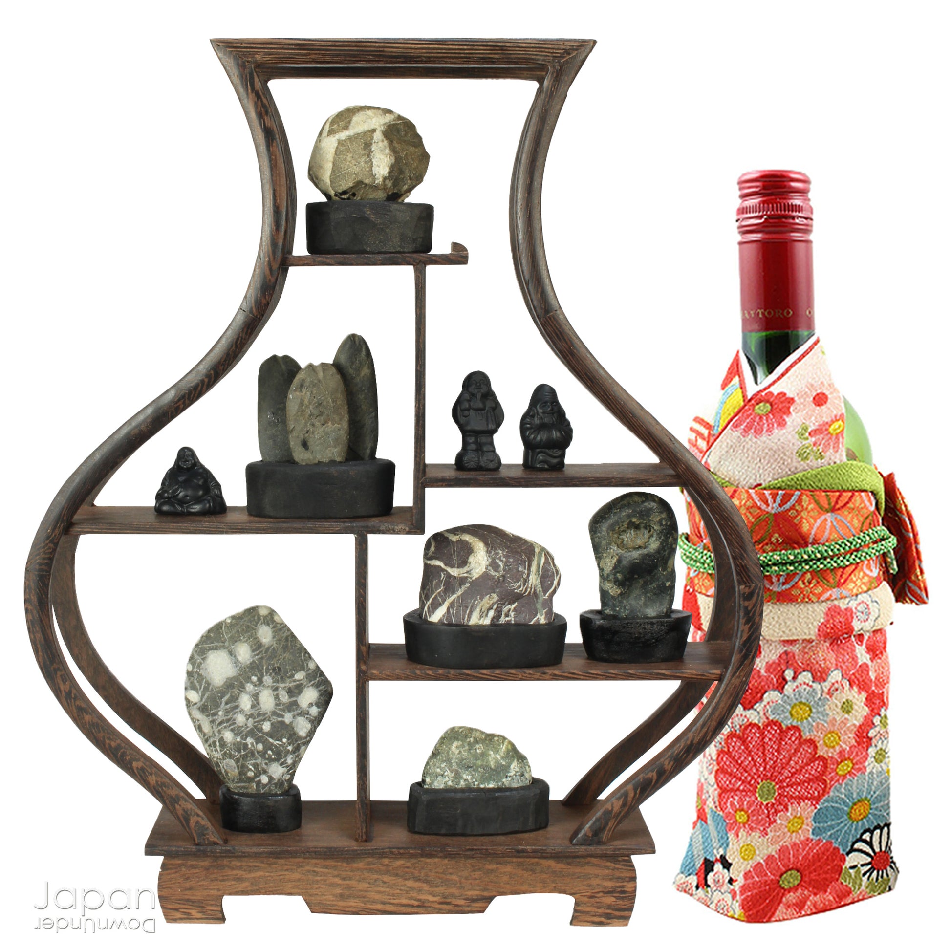 Elevate your home decor with this striking, modern collection of vintage Japanese miniature suiseki stones, beautifully arranged on a handcrafted, vase-shaped segmented shelf. These naturally sculpted stones evoke the essence of serene landscapes and bring a sense of harmony, sophistication, and contemplative stillness to any space.
