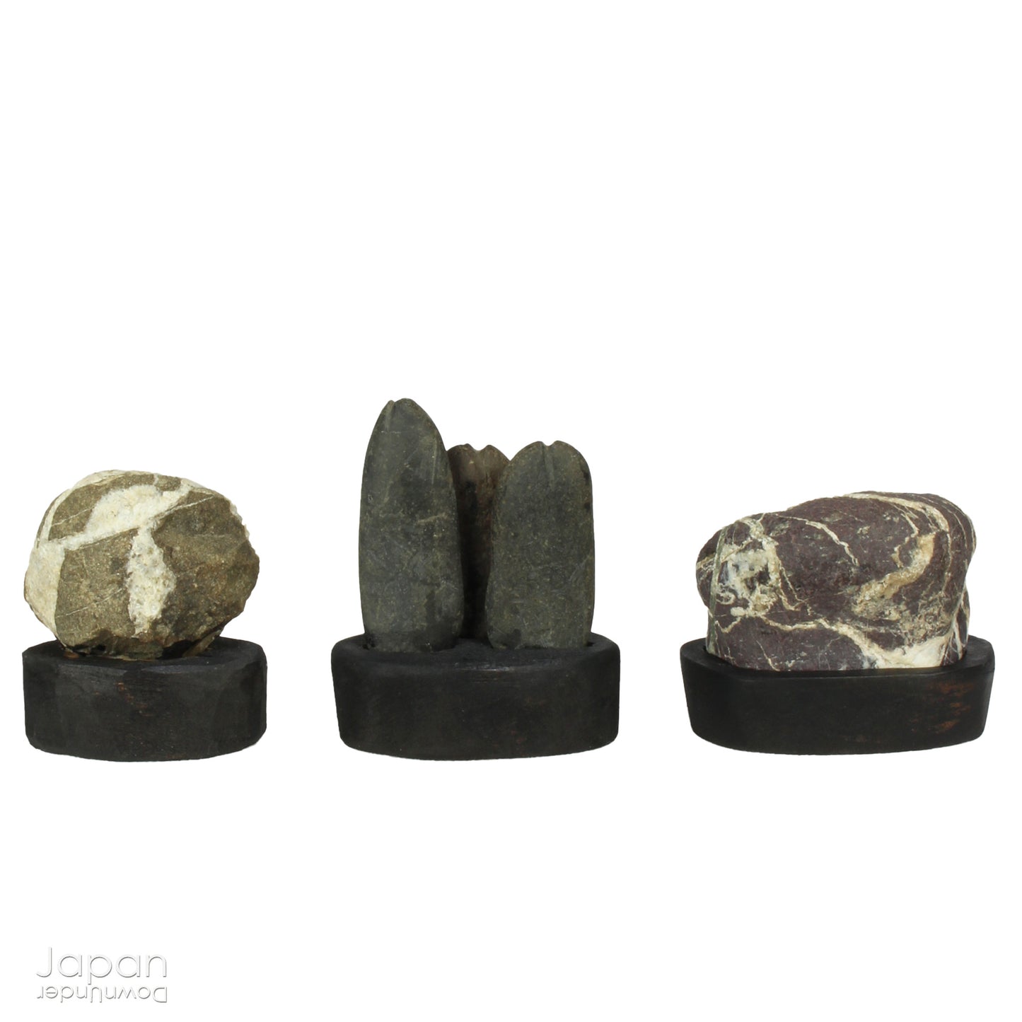 Elevate your home decor with this striking, modern collection of vintage Japanese miniature suiseki stones, beautifully arranged on a handcrafted, vase-shaped segmented shelf. These naturally sculpted stones evoke the essence of serene landscapes and bring a sense of harmony, sophistication, and contemplative stillness to any space.