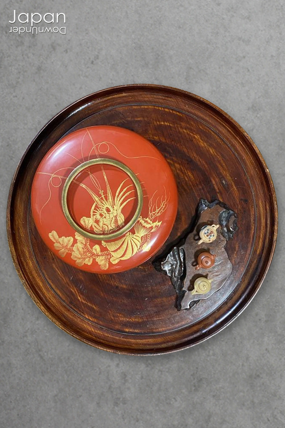 A refined and exquisite example of Meiji-era artistry, this red lacquer lidded sweet bowl - known as an ohira - dates to 1894 (the 27th year of Meiji, Year of the Horse). Perfect as a statement piece or storage for small precious items, it embodies sophistication and charm, bringing a touch of traditional artistry and timeless elegance to your home.