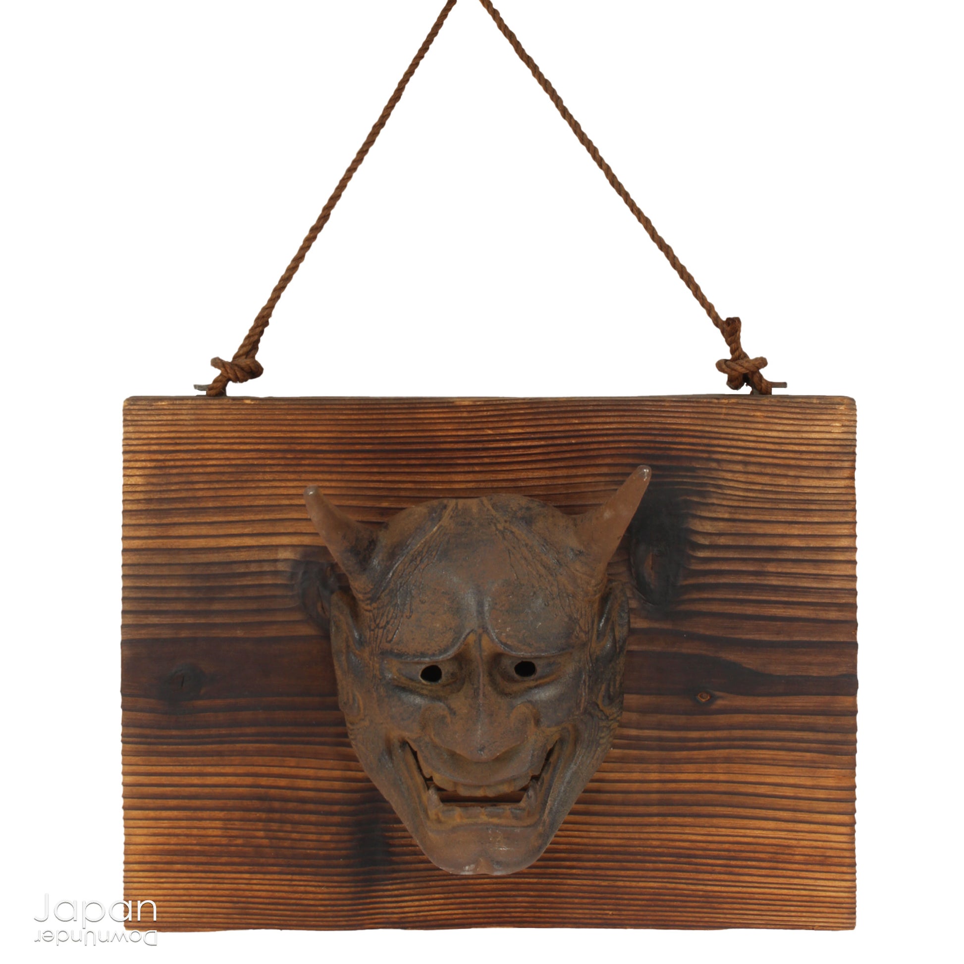 Enhance your space with this unique piece of Japanese folk art! A captivating old rusted bronze Hannya mask mounted on a charming rustic wood plaque - a truly wonderful addition to your wall decor. Infuse your home with the character and culture of this stunning find!