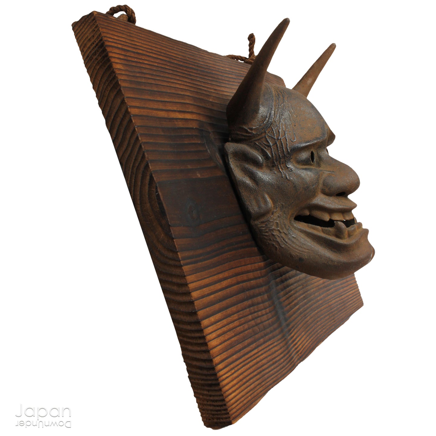 Enhance your space with this unique piece of Japanese folk art! A captivating old rusted bronze Hannya mask mounted on a charming rustic wood plaque - a truly wonderful addition to your wall decor. Infuse your home with the character and culture of this stunning find!