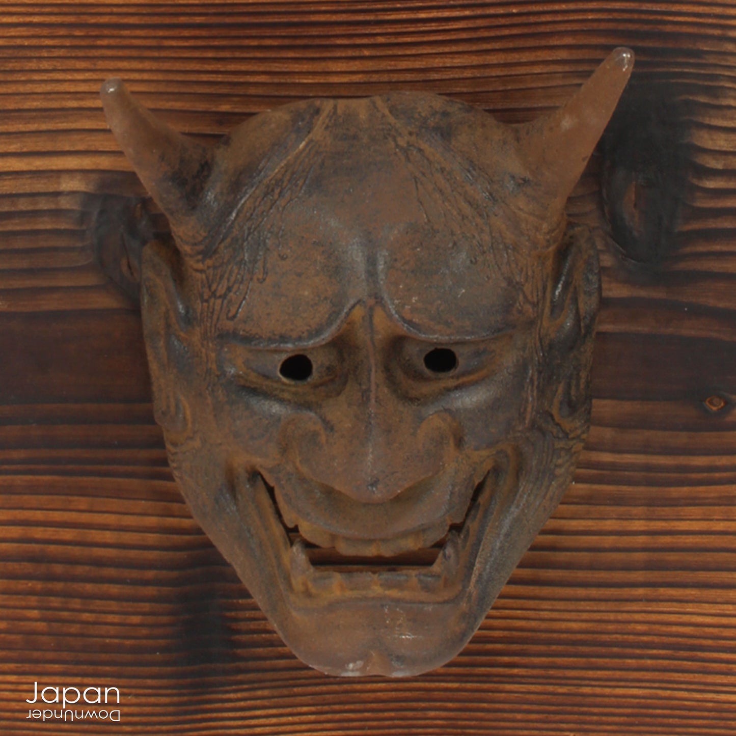 Enhance your space with this unique piece of Japanese folk art! A captivating old rusted bronze Hannya mask mounted on a charming rustic wood plaque - a truly wonderful addition to your wall decor. Infuse your home with the character and culture of this stunning find!