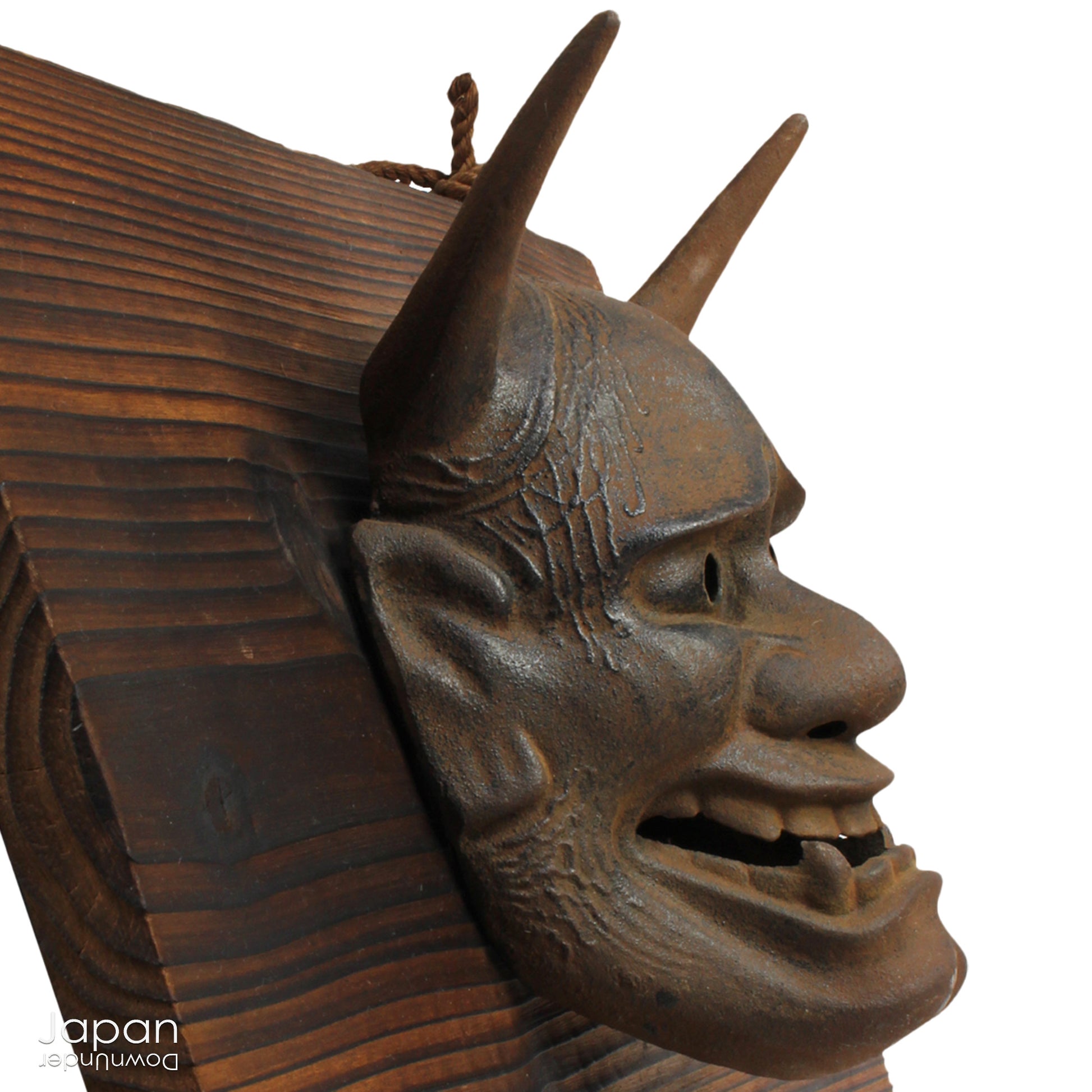 Enhance your space with this unique piece of Japanese folk art! A captivating old rusted bronze Hannya mask mounted on a charming rustic wood plaque - a truly wonderful addition to your wall decor. Infuse your home with the character and culture of this stunning find!