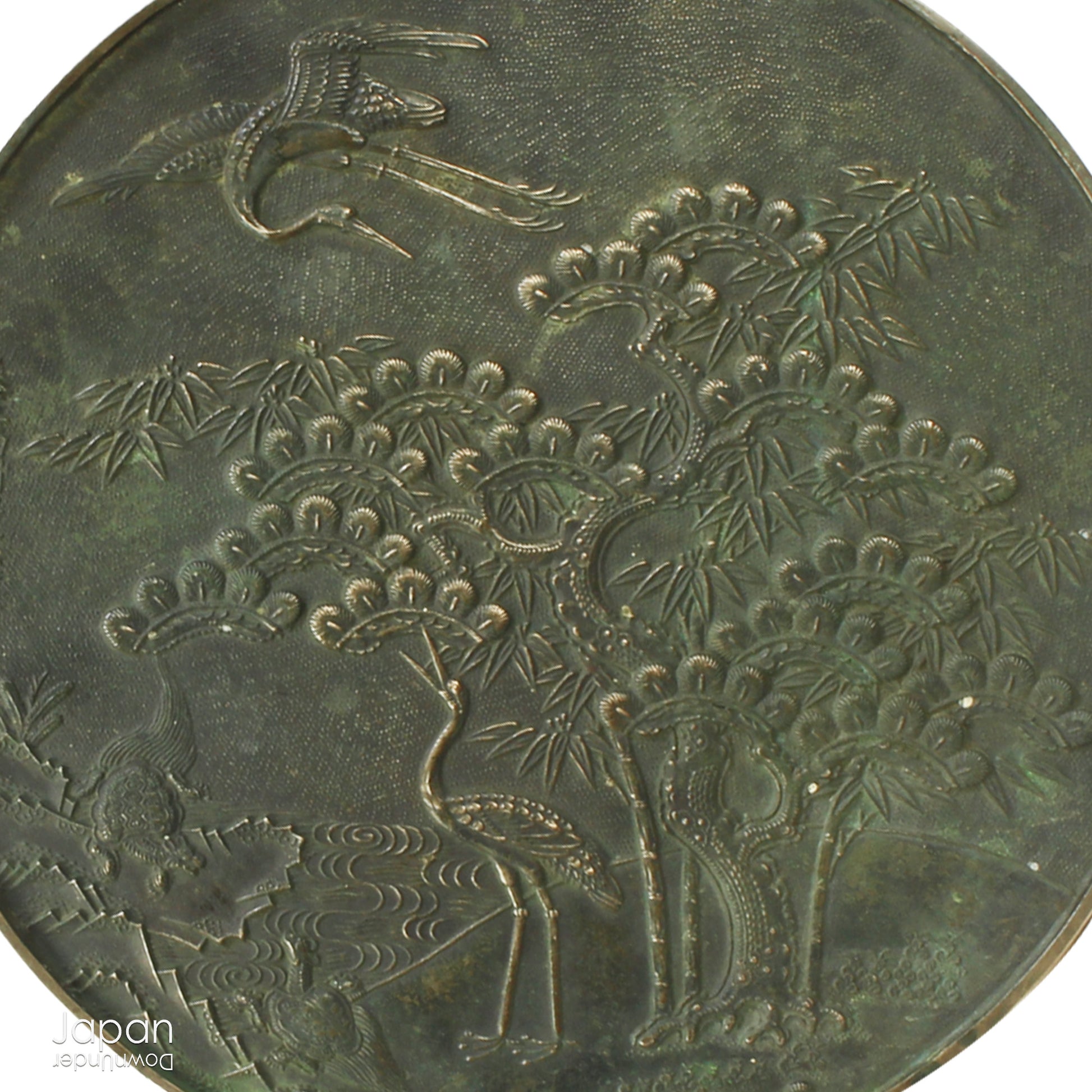 Enhance your spiritual space with this majestic rare antique Shinto shrine mirror. Resting on an intricately carved stand, this piece is a unique and beautiful addition to any sacred setting. Invite tranquility and elegance into your home with this spiritual space enhancer.