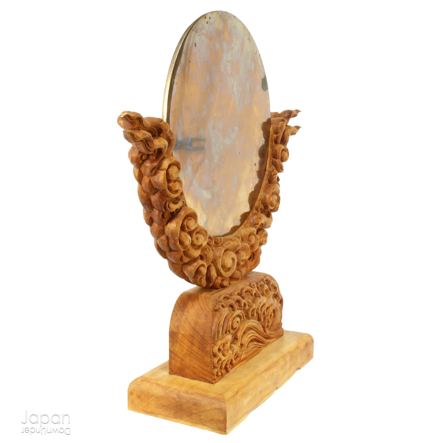 Enhance your spiritual space with this majestic rare antique Shinto shrine mirror. Resting on an intricately carved stand, this piece is a unique and beautiful addition to any sacred setting. Invite tranquility and elegance into your home with this spiritual space enhancer.