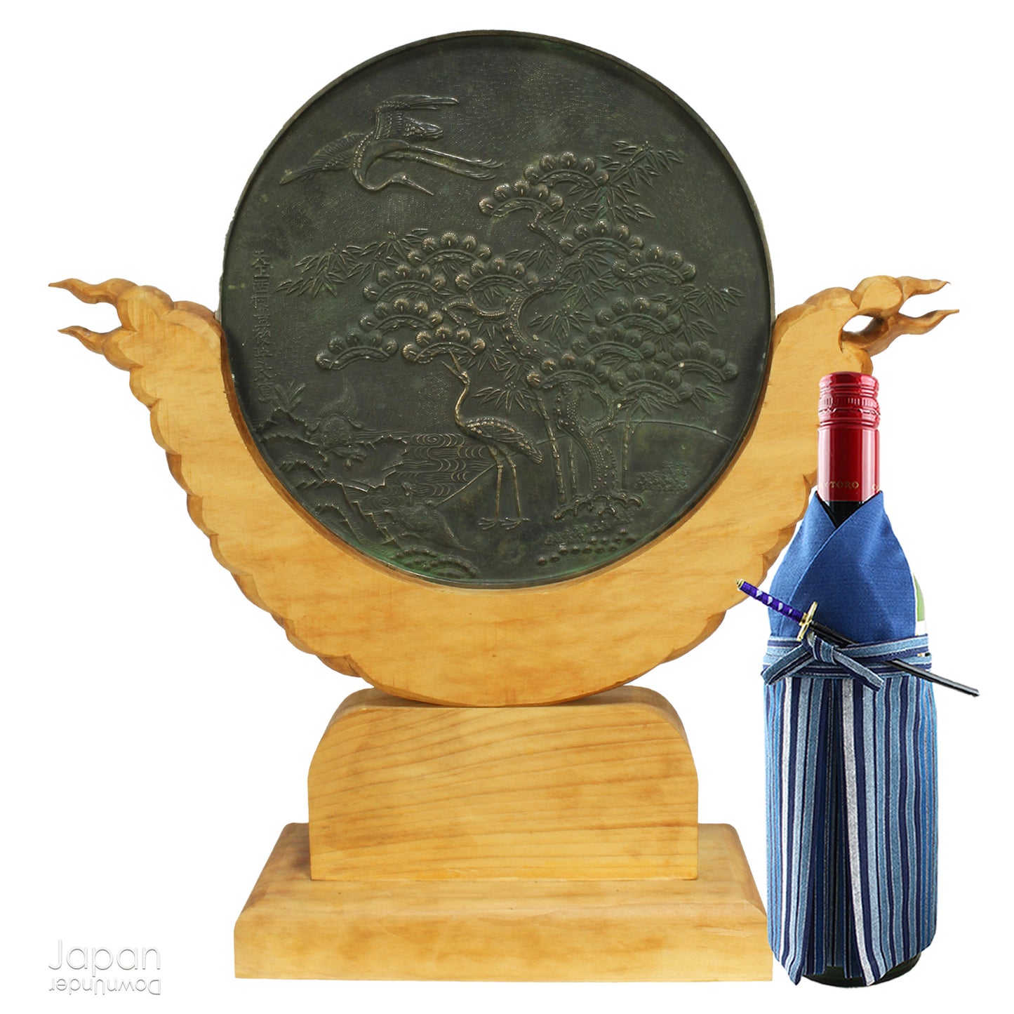 Enhance your spiritual space with this majestic rare antique Shinto shrine mirror. Resting on an intricately carved stand, this piece is a unique and beautiful addition to any sacred setting. Invite tranquility and elegance into your home with this spiritual space enhancer.