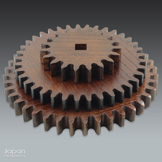 Add a touch of history and rustic charm to your home with these exquisite handcrafted wooden gears, salvaged from the rich tradition of Japan's silk industry. Perfect for those who appreciate the beauty of industrial antiques, these cogs will transform any space into a timeless display.
