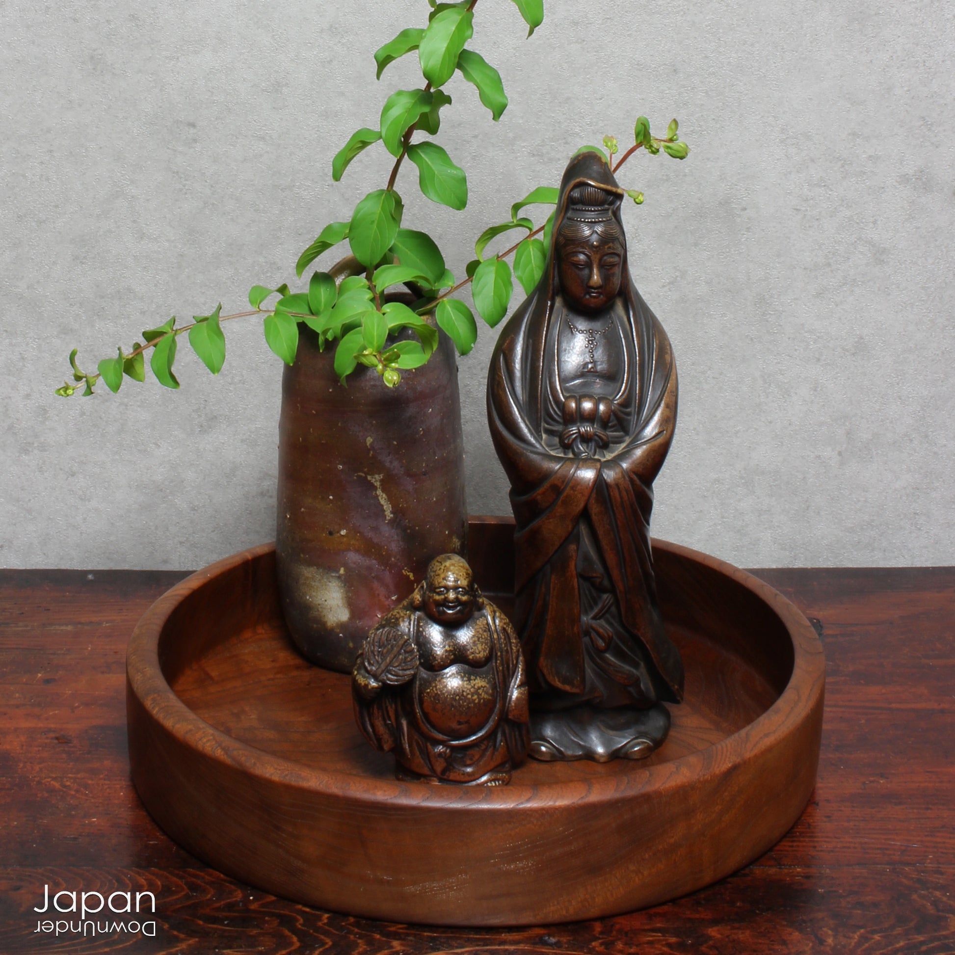 Elevate the ambiance of your home or office with this stunning antique Bizen statue of Kannon, the revered Goddess of Mercy. Masterfully crafted with intricate detail, this statue exudes a timeless sense of serenity and grace, perfect for creating a peaceful atmosphere in any setting.