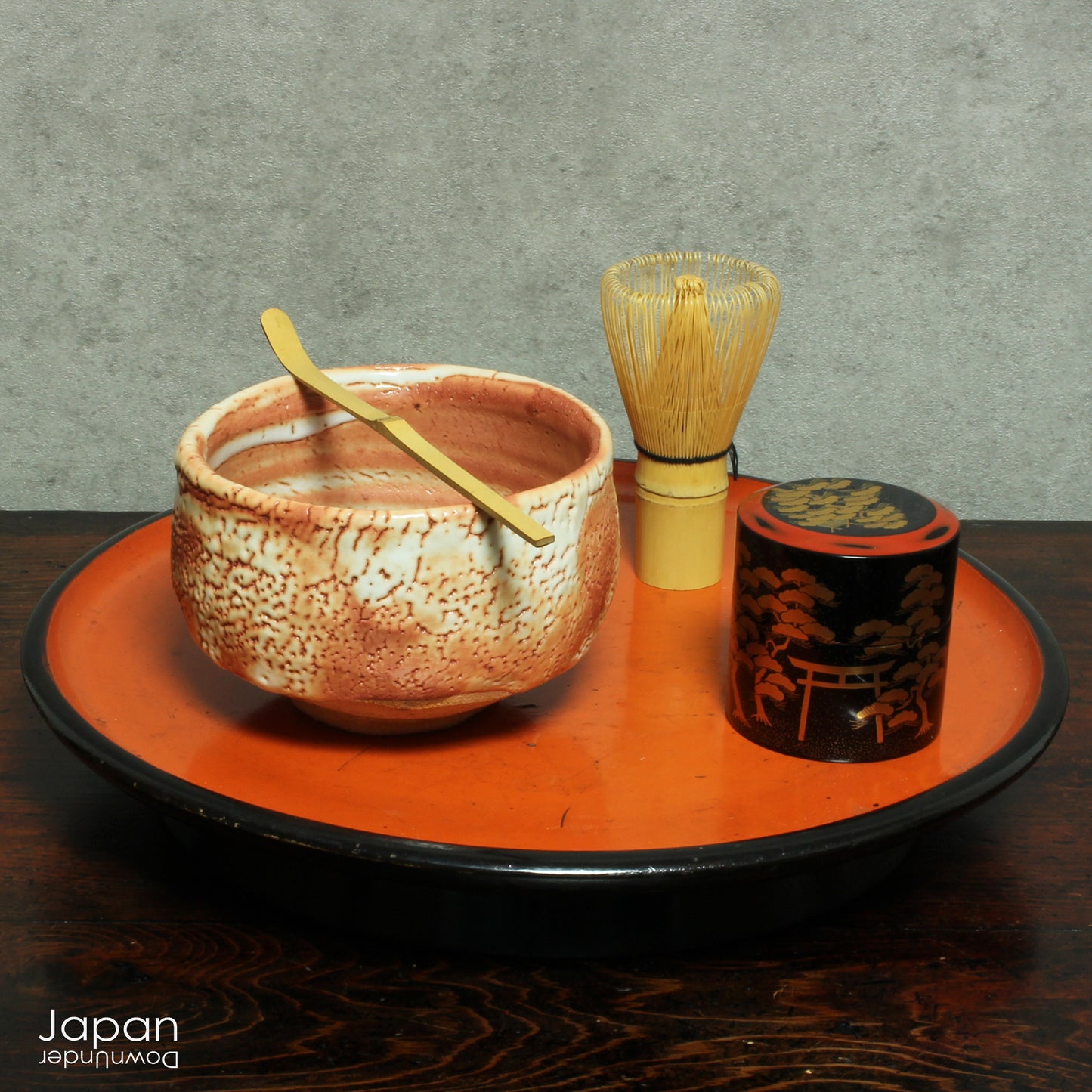 Elevate your tea ceremony with this stunning vintage matcha tea bowl, a piece that blends timeless beauty and exceptional craftsmanship. This one-of-a-kind bowl, with its delicate fusion of pale orange and white markings, is the perfect addition to your collection, allowing you to sip your matcha in style.
A Shino ware ceramic from Gifu Prefecture, this bowl features a soft, pale orange hue, enveloped in a thick, milky white glaze that creates a unique, curdled texture with charming tiny holes. The random