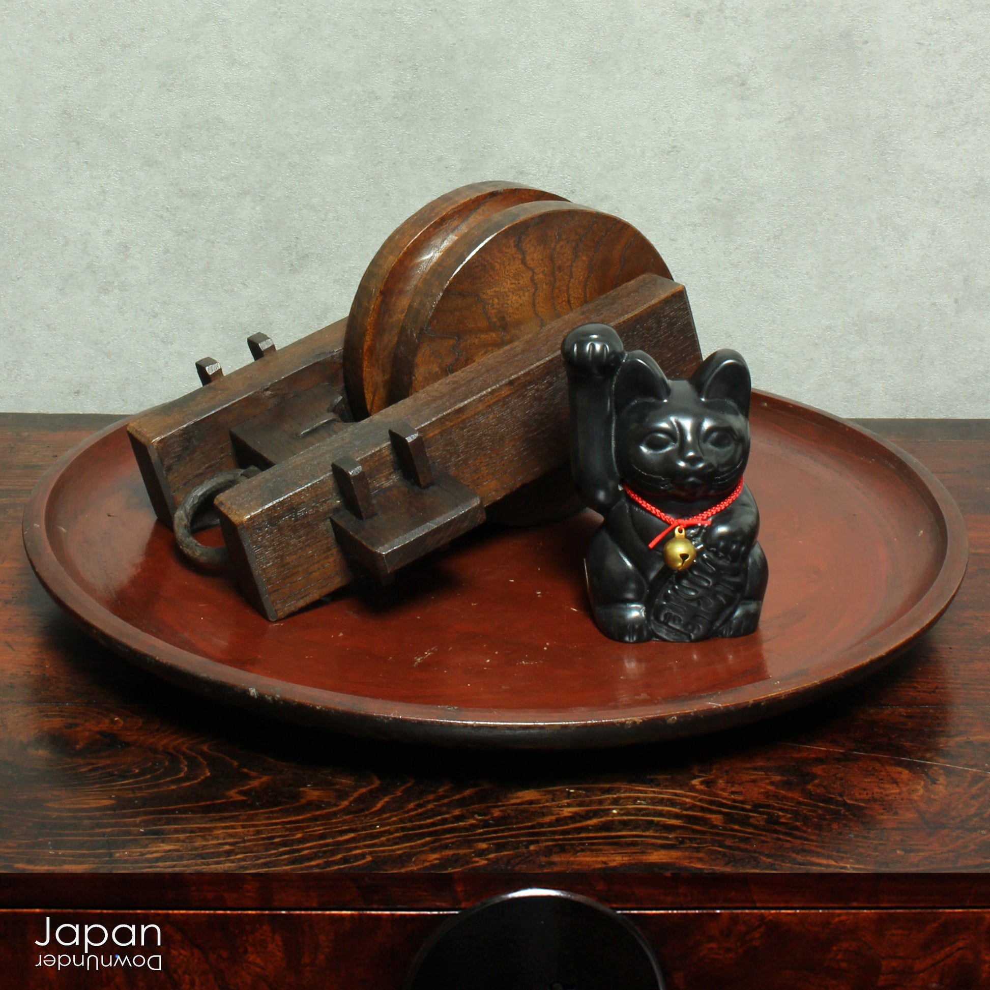 Bring a touch of authentic Japanese rustic charm into your home or garden with this exquisite antique well pulley, a fine example of traditional mingei (folk craft). Expertly crafted from keyaki (Japanese zelkova), a highly prized hardwood known for its strength and stunning grain, this piece is both a functional relic and a beautiful decorative accent.