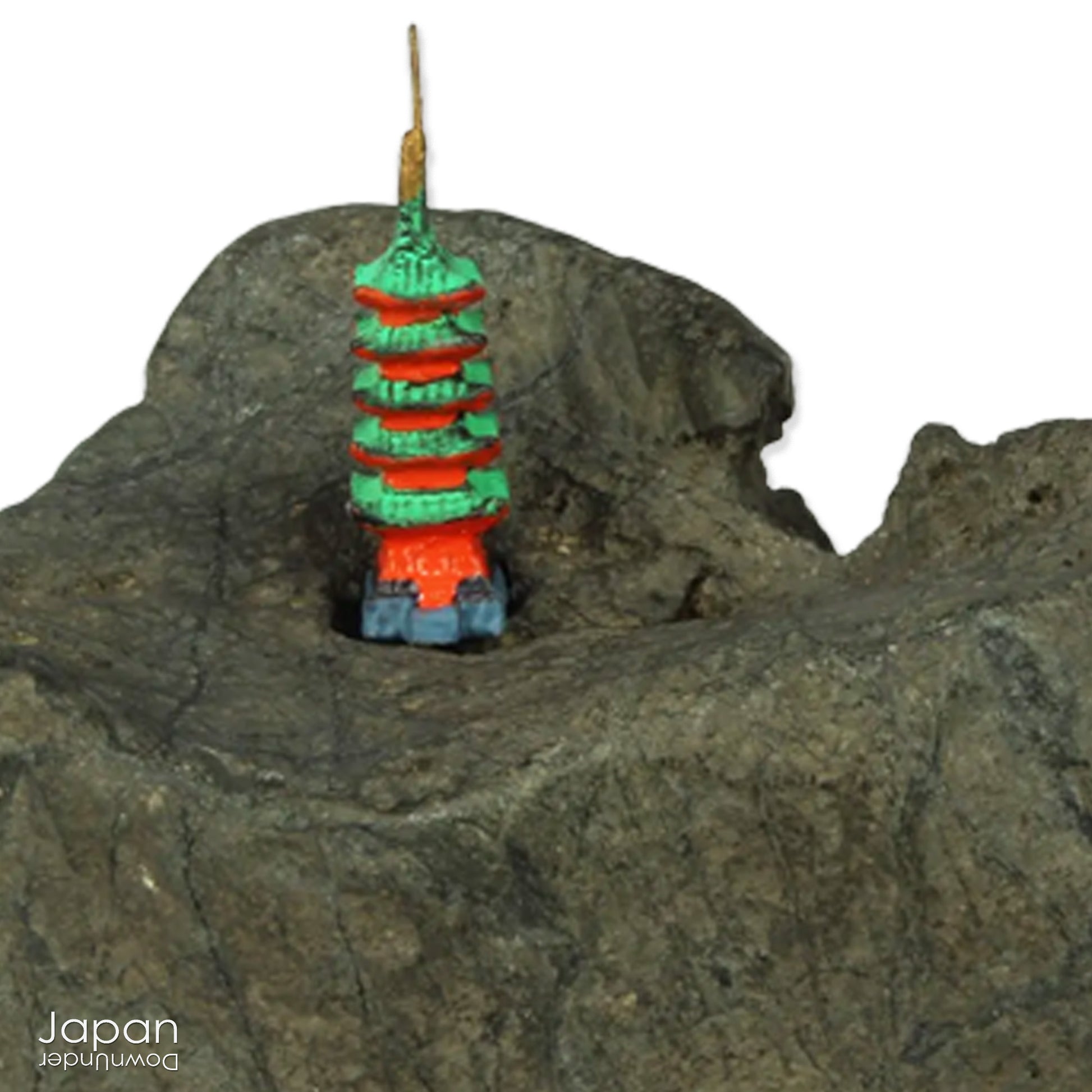 This vintage Japanese suiseki offers a quiet meditation on nature’s artistry ;a naturally weathered stone that embodies stillness, grace, and introspection. Resting atop an intricately hand-carved daiza, it invites the viewer into a space of reflection and reverence, where simplicity holds profound depth.