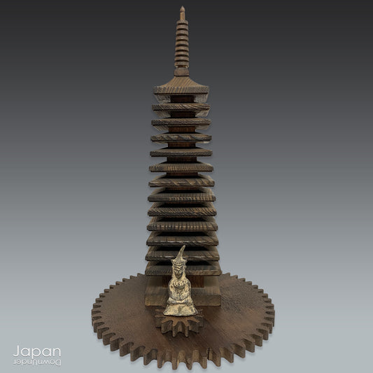 Elevate the energy of your space with this attractive wooden pagoda statue from the renowned Tanzan Shrine in Nara.  Evoking serenity and peace, this timeless piece is more than just a decorative item—it's a symbol of good fortune, positive energy, and spiritual enlightenment. Perfect for bringing harmony into your home or office, it serves as a powerful and elegant reminder of life's blessings.
