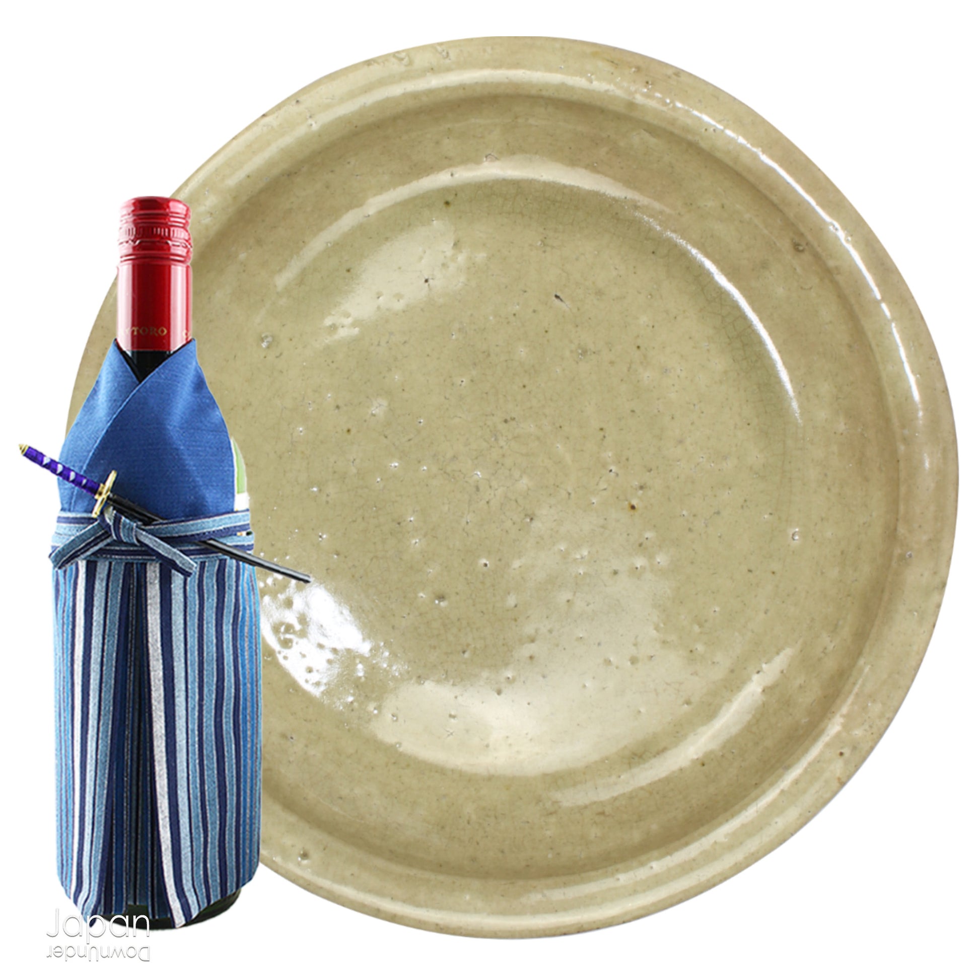 Step into a world of history and artistry with this stunning antique folk art large stoneware serving plate. A true vintage treasure, this piece offers a rare glimpse into the artistry of the Edo and Meiji eras, capturing the essence of a bygone time.