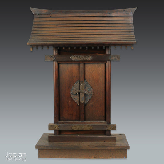 Bring a piece of history into your home with this old Shinto folk faith shrine, perfect for creating a sacred space on your own kamidana (god shelf) or within your home. Exuding a delightful charm it is ideal for collectors or those seeking serenity.