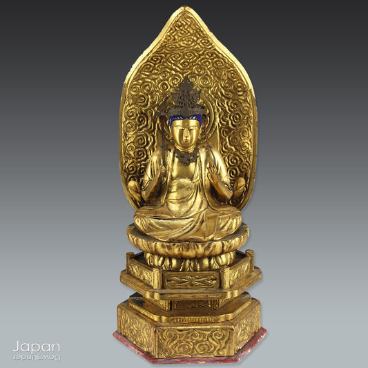 Bring a sense of ancient serenity and profound beauty to your home with this 15-inch Buddhist gold gilt wood Dainichi Nyorai statue. Handcrafted with exceptional attention to detail, this Japanese antique offers more than just a decorative piece.