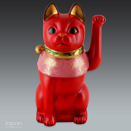 Welcome good fortune and success into your home with this delightful red maneki neko - Japan’s beloved lucky cat. Thought to attract luck and prosperity, this charming talisman is perfect for cat lovers and admirers of Japanese culture alike.