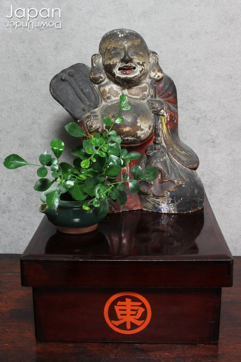 A wonderful piece of history, this charming 1800’s clay doll, shaped as Hotei, is the god of contentment and happiness and the guardian of children. This unique Shinto amulet is a rare find, adding a touch of whimsy and protection to your home.