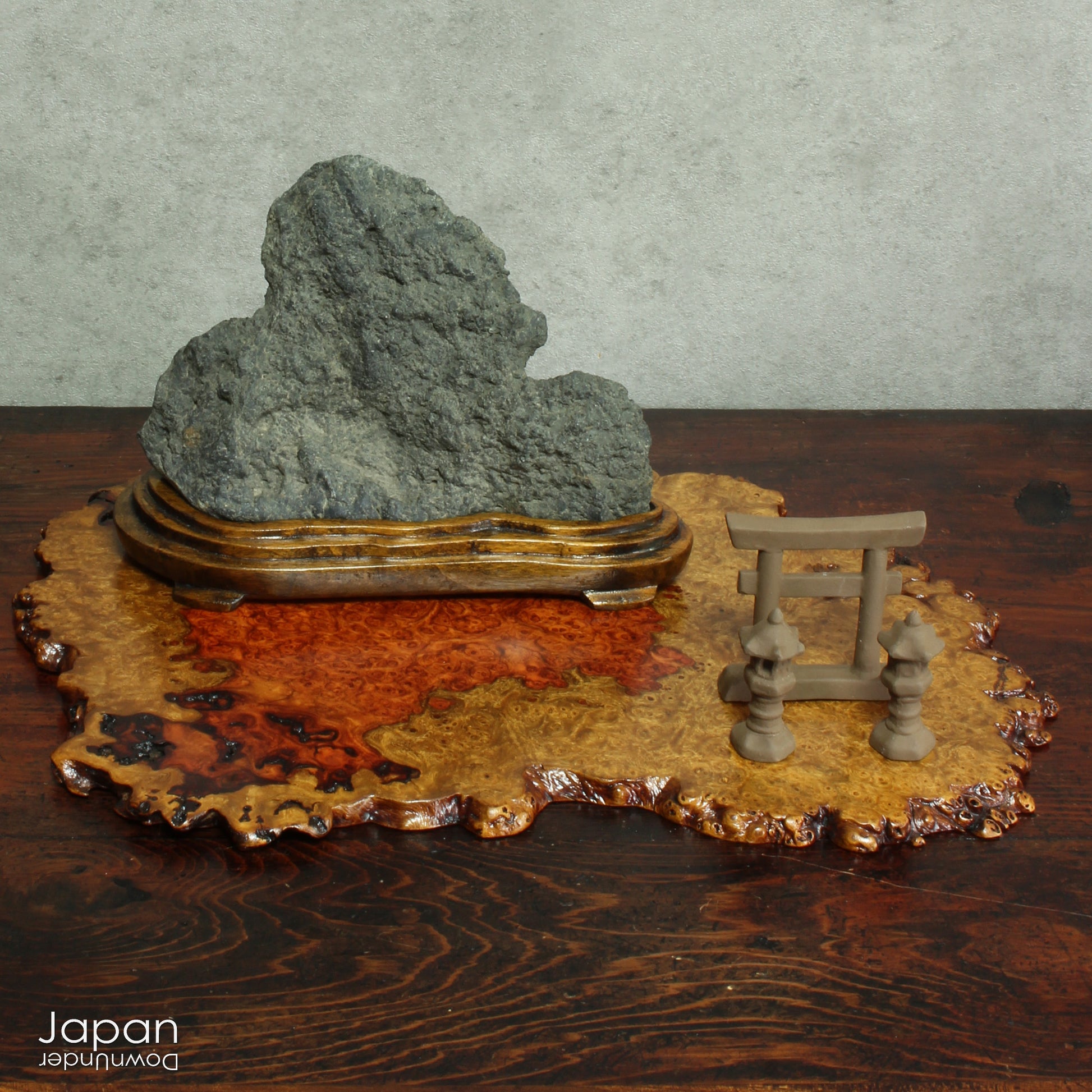 Bring timeless elegance and natural beauty into your space with this exquisite stand, handcrafted from rare burled Chinese quince wood. Designed to showcase bonsai, suiseki viewing stones, treasured ornaments, or seasonal flower arrangements, this piece adds a refined touch to any setting.