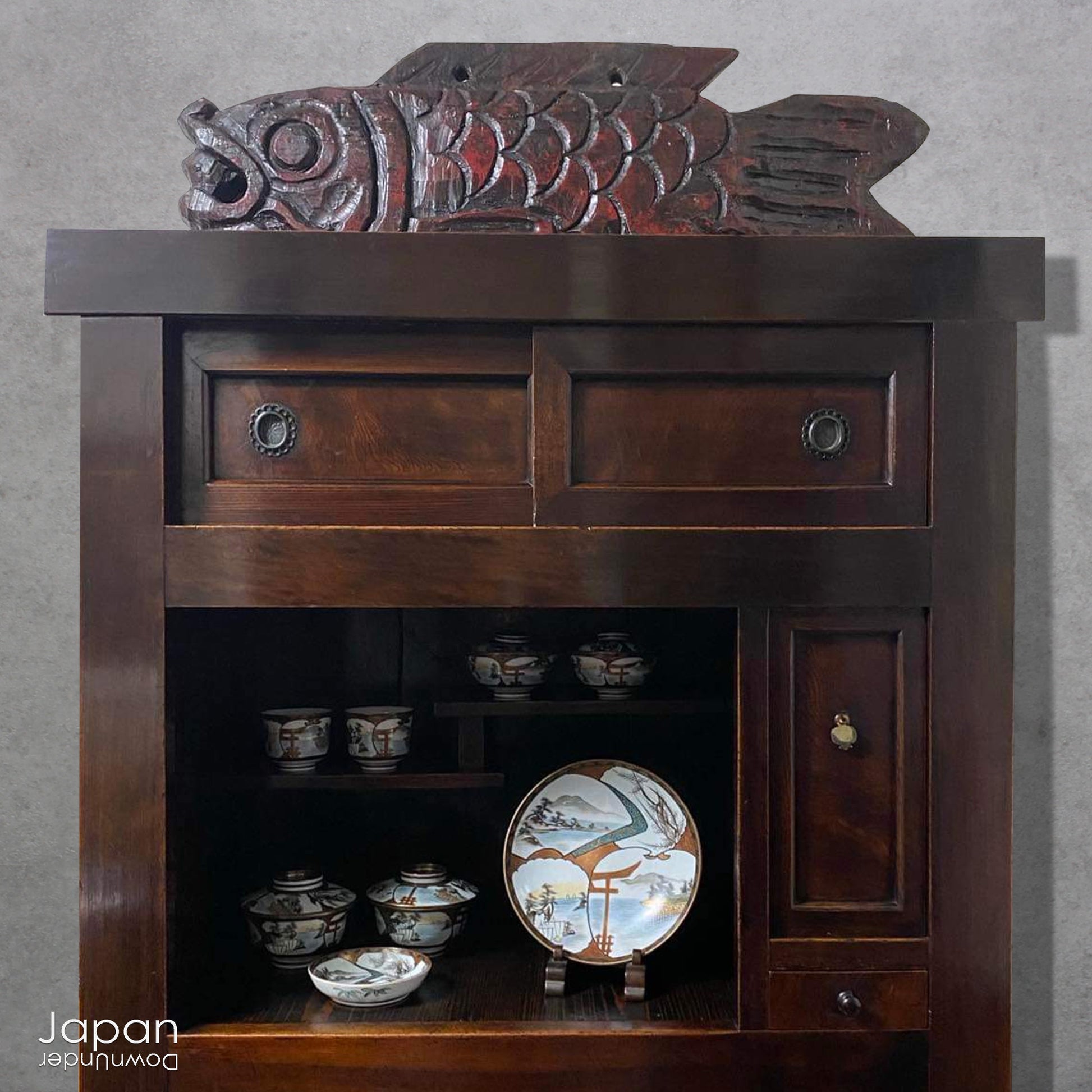 Transform your space with the beauty and history of this remarkable extra-large wooden Buddhist fish drum, a stunning piece that effortlessly blends rustic elegance with spiritual significance. Handcrafted with precision and care, this drum serves as a striking religious accent, perfect for any space with a touch of serenity and cultural depth.