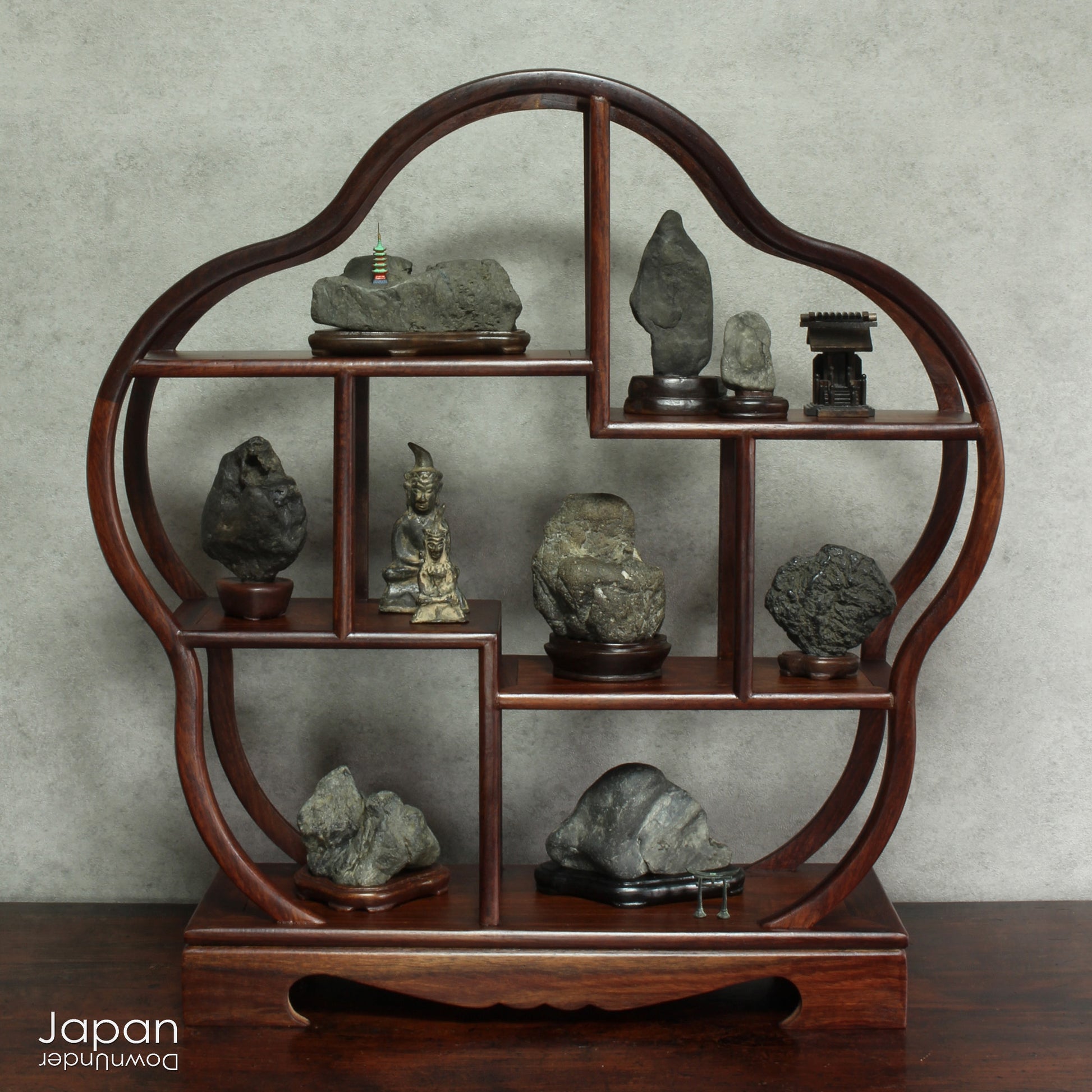 Invite a sense of contemplative calm into your space with this evocative pair of vintage Japanese suiseki - natural stones shaped by the slow, patient hands of time. Rooted in the Japanese aesthetic traditions of wabi-sabi and the reverence for impermanence, these stones are more than mere objects; they are landscapes in miniature, vessels of stillness, and silent poems composed by nature itself.