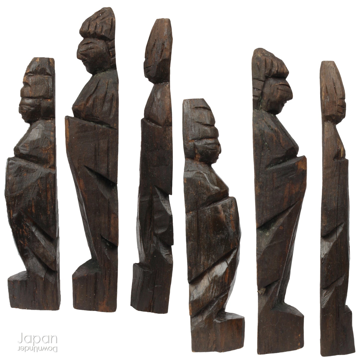 A collection of old hand-carved Enku-style Buddha and Kannon statues.  Enku was a Buddhist monk, much loved for his simple, folk art statues, carved during his many pilgrimages  to the mountains.  These old carvings are made of a light wood.