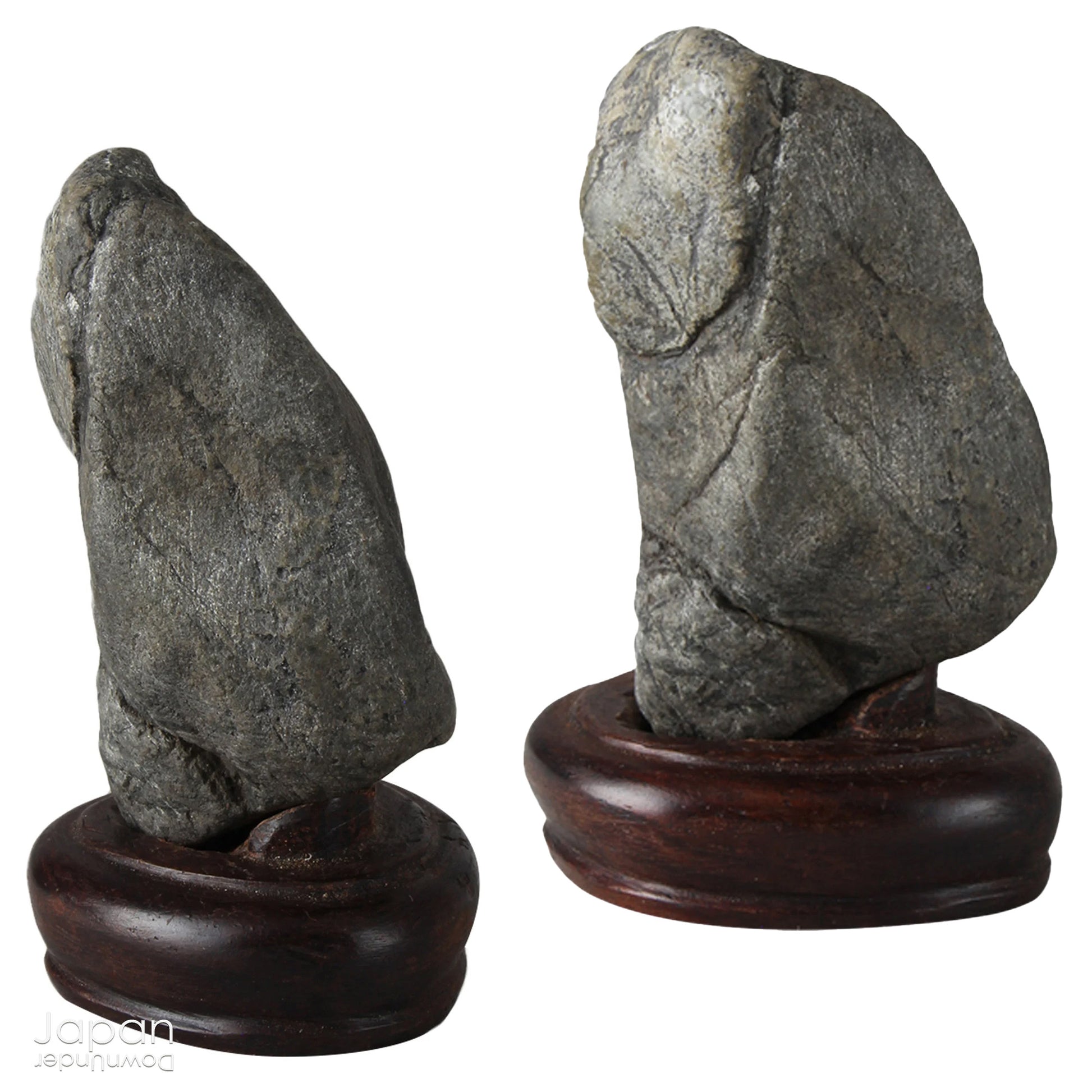 Invite a sense of contemplative calm into your space with this evocative pair of vintage Japanese suiseki - natural stones shaped by the slow, patient hands of time. Rooted in the Japanese aesthetic traditions of wabi-sabi and the reverence for impermanence, these stones are more than mere objects; they are landscapes in miniature, vessels of stillness, and silent poems composed by nature itself.