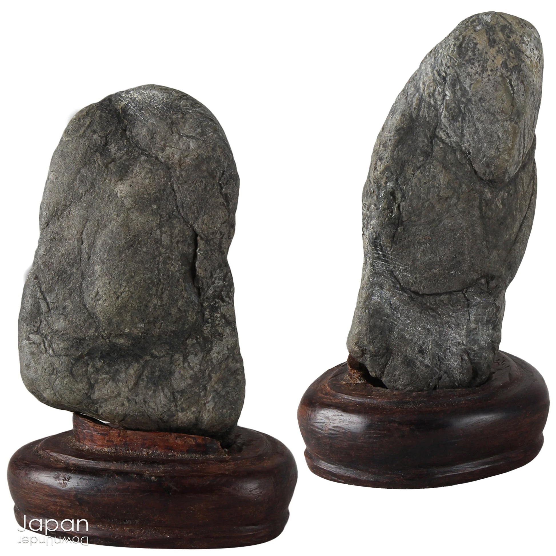 Invite a sense of contemplative calm into your space with this evocative pair of vintage Japanese suiseki - natural stones shaped by the slow, patient hands of time. Rooted in the Japanese aesthetic traditions of wabi-sabi and the reverence for impermanence, these stones are more than mere objects; they are landscapes in miniature, vessels of stillness, and silent poems composed by nature itself.